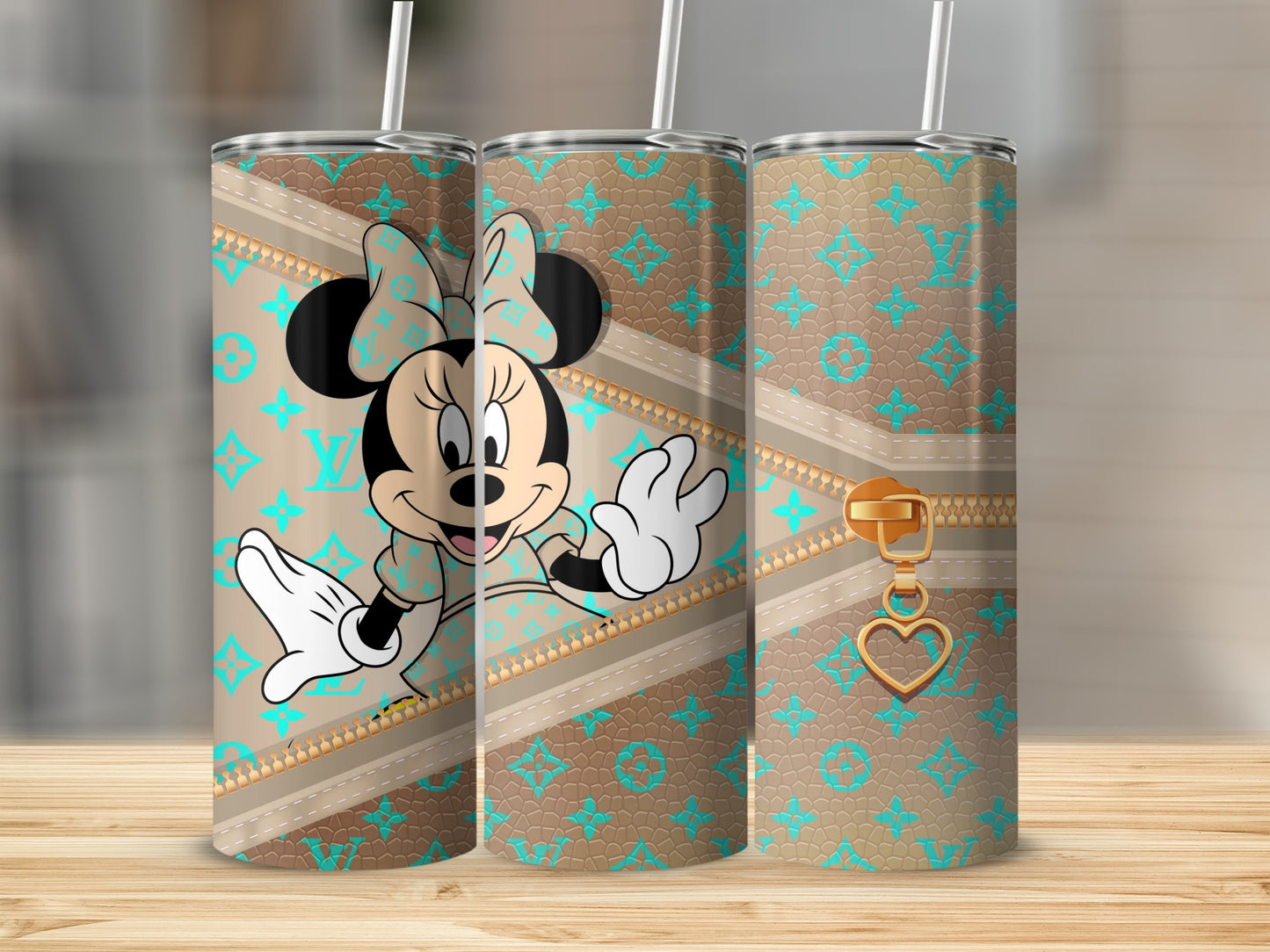 Minnie Mouse on a designer pattern tumbler with gold zipper detail.