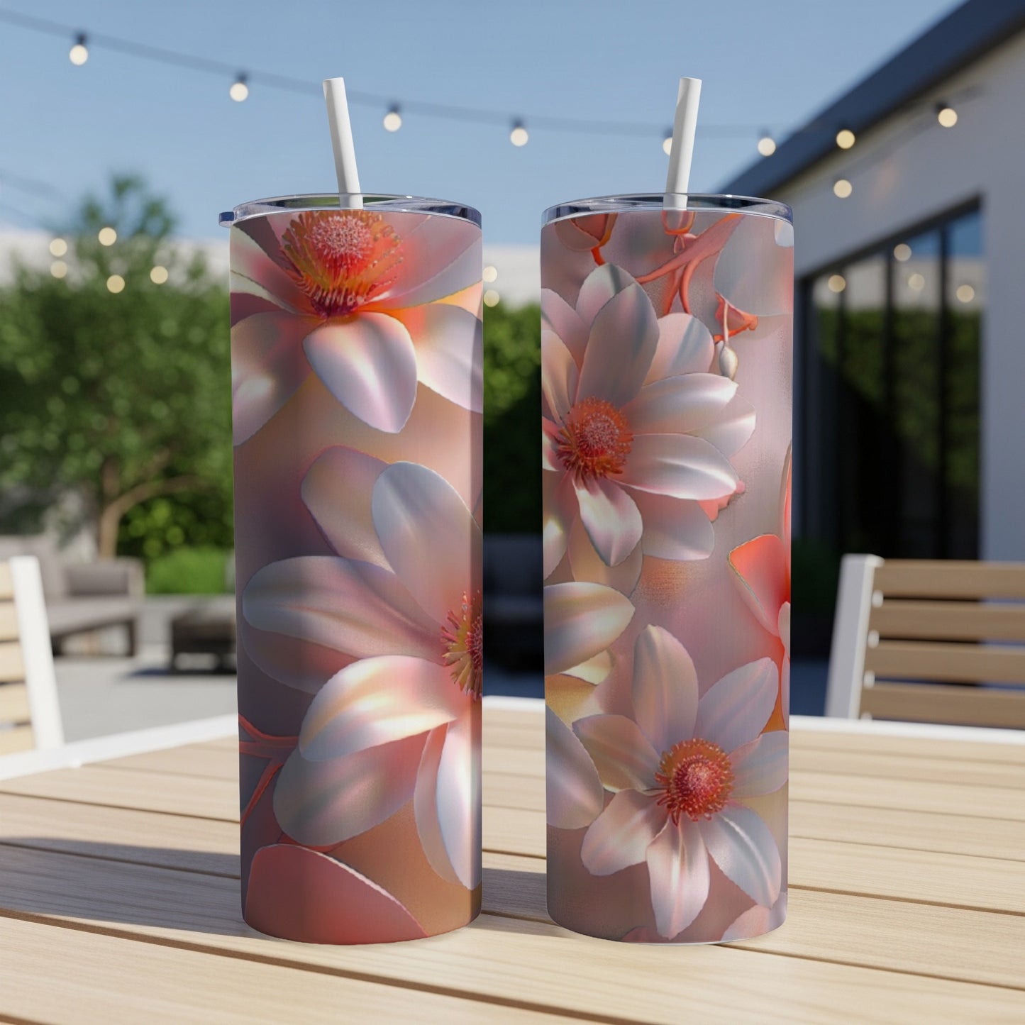 Two tall tumblers with a floral pattern of pink and white flowers.