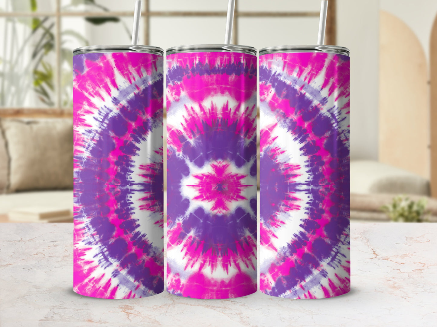 Three tumblers with a white, pink, and purple tie-dye pattern shown on a marble surface.