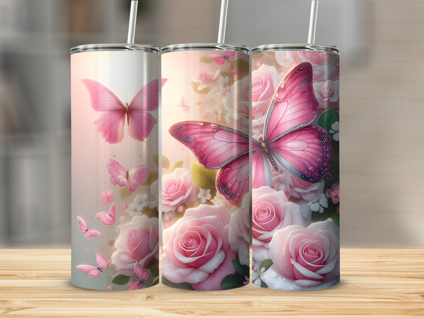 Three tumblers with pink butterflies and roses.