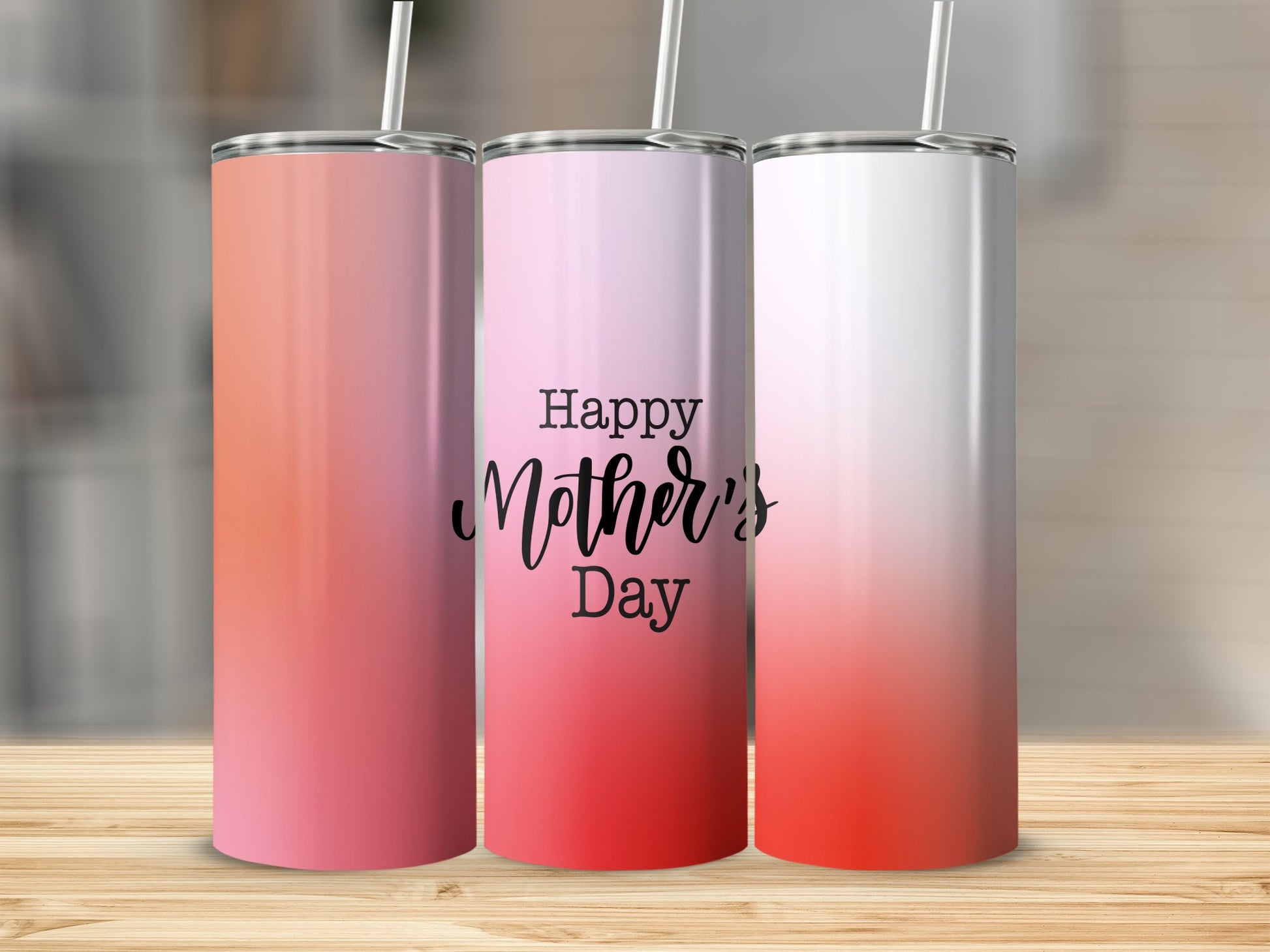 Three skinny tumblers with ombre pink and white designs, one reads "Happy Mother's Day."