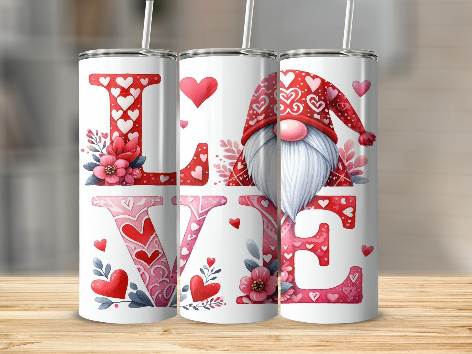 Three tumblers with "LOVE" text, hearts, and a gnome design.