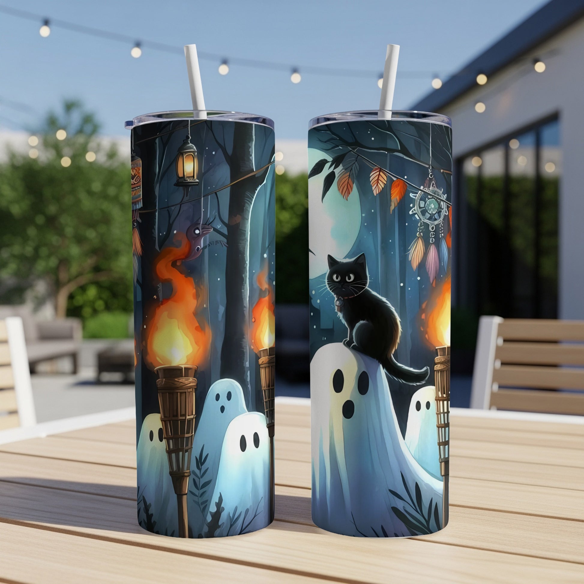 Two tumblers with a Halloween design featuring a black cat, ghosts, and lanterns.