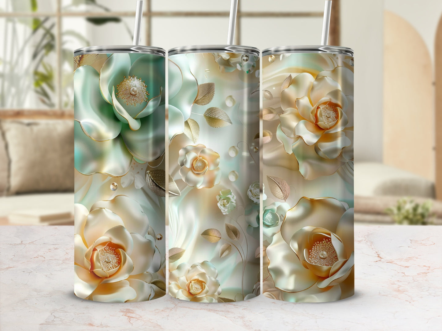 Three tumblers with ornate floral and leaf designs in shades of green and gold.