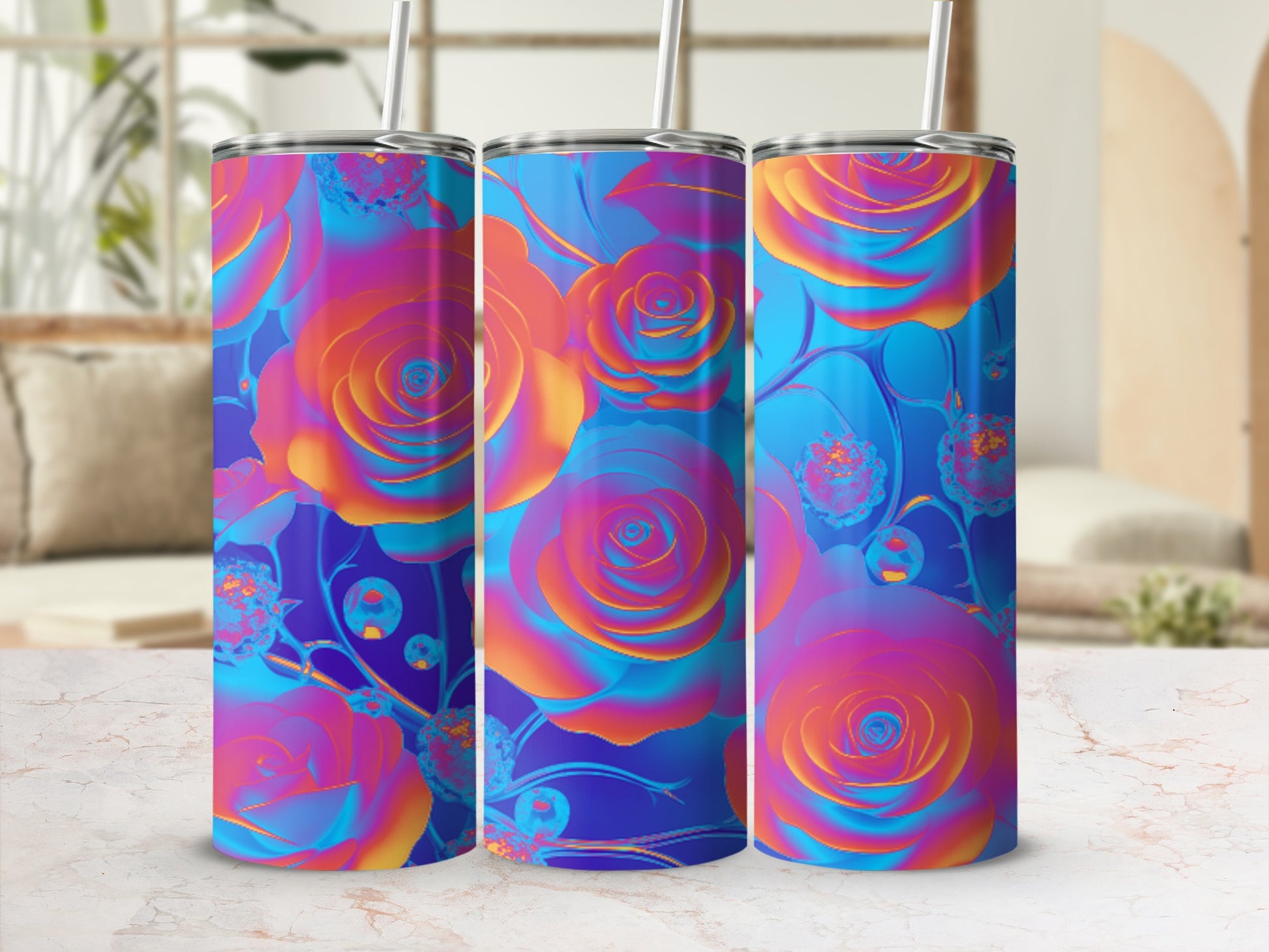 Three tumblers with a vibrant floral rose pattern in shades of blue, pink, and orange.