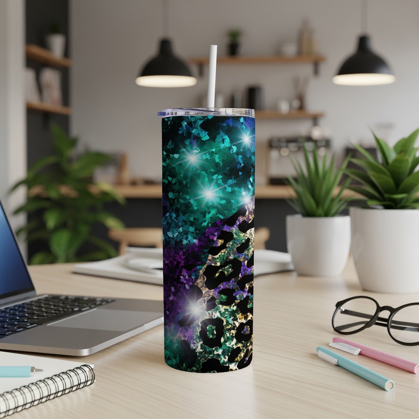Tall tumbler with a teal, purple, and gold glitter leopard print design.