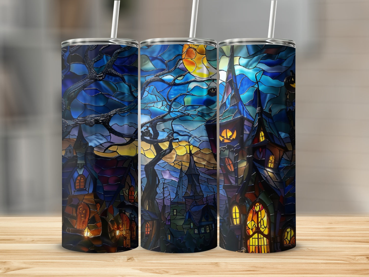 Stained glass tumbler featuring a spooky haunted house scene with moonlit sky.