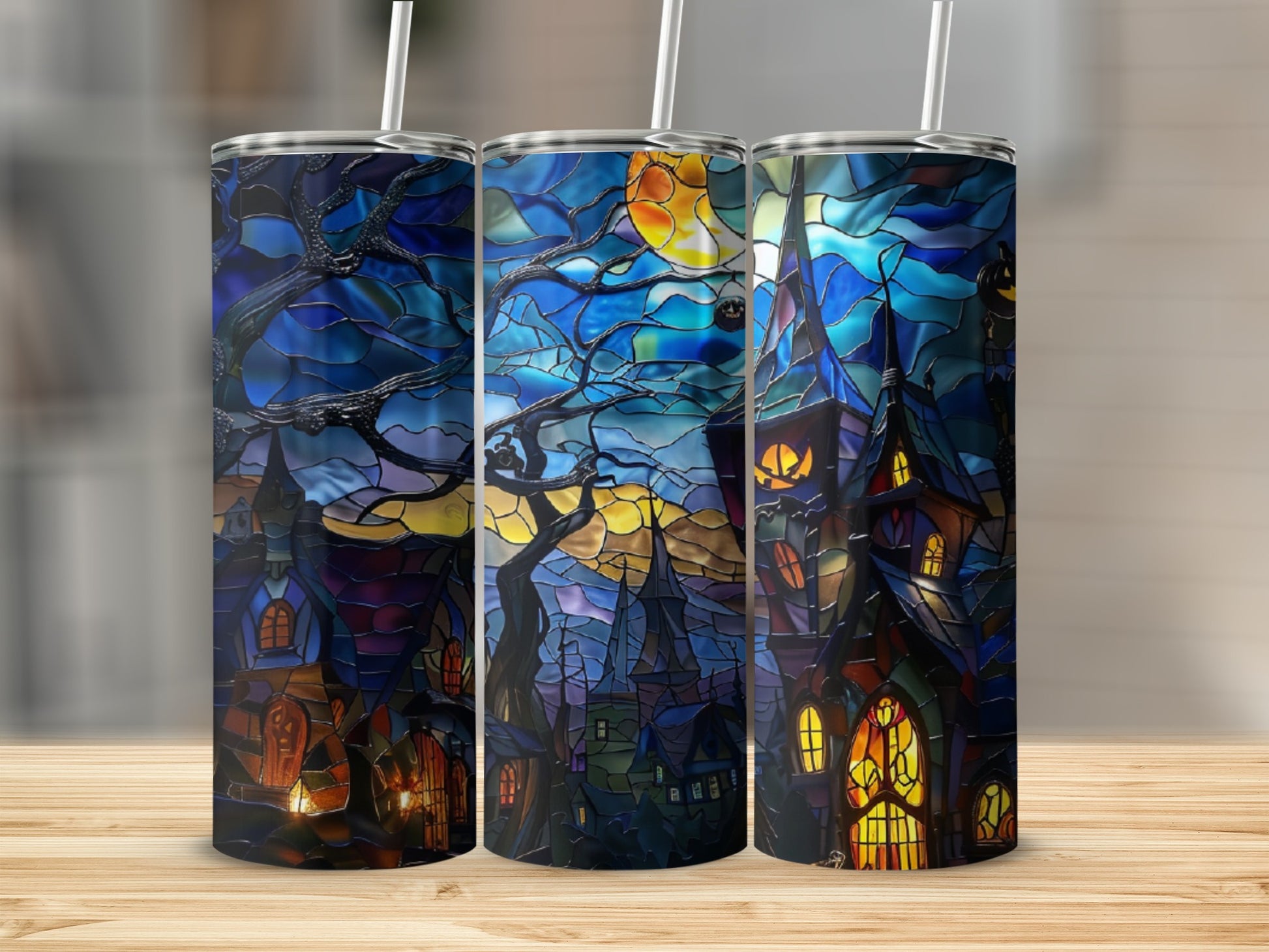Stained glass tumbler featuring a spooky haunted house scene with moonlit sky.