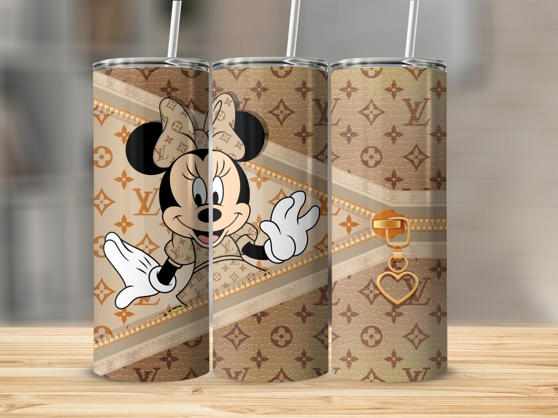 Minnie Mouse on designer pattern tumbler with zipper and heart charm.