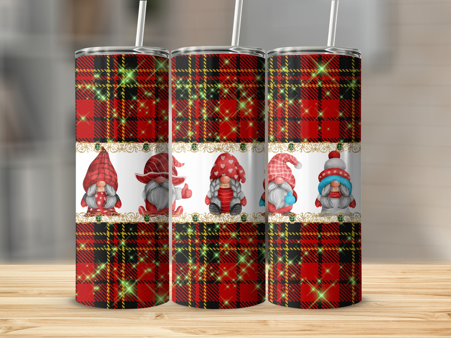 Three gnomes wearing red hats and cozy outfits on a plaid background.