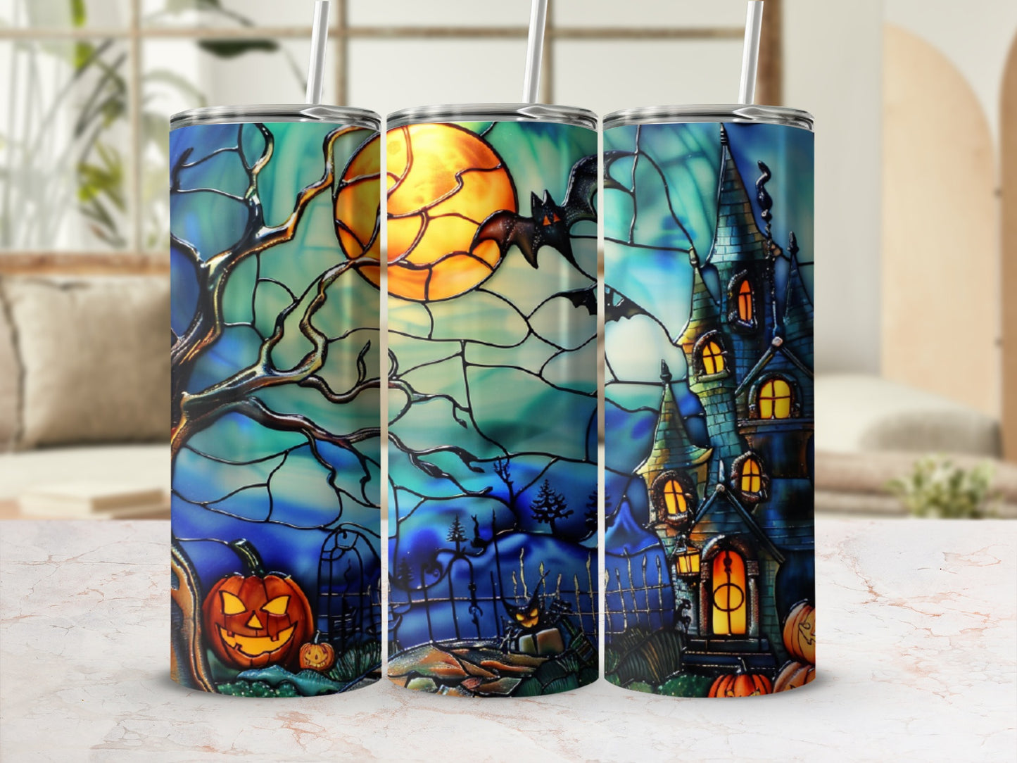 Halloween tumbler with pumpkin, castle, moon, and bat design.