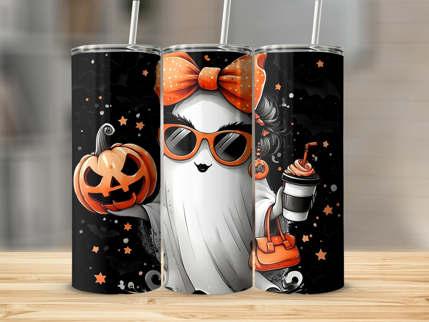 Three Halloween-themed tumblers featuring a cartoon ghost holding a pumpkin, wearing sunglasses and a bow.