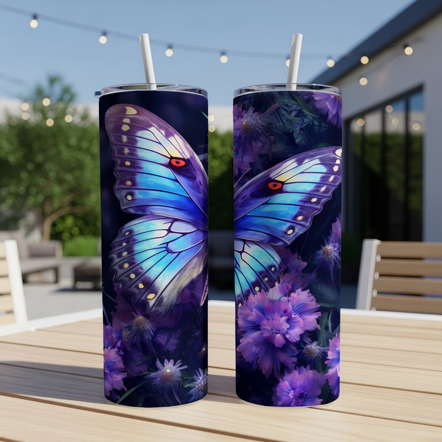 Two tumblers with a vibrant blue butterfly and purple flowers design.