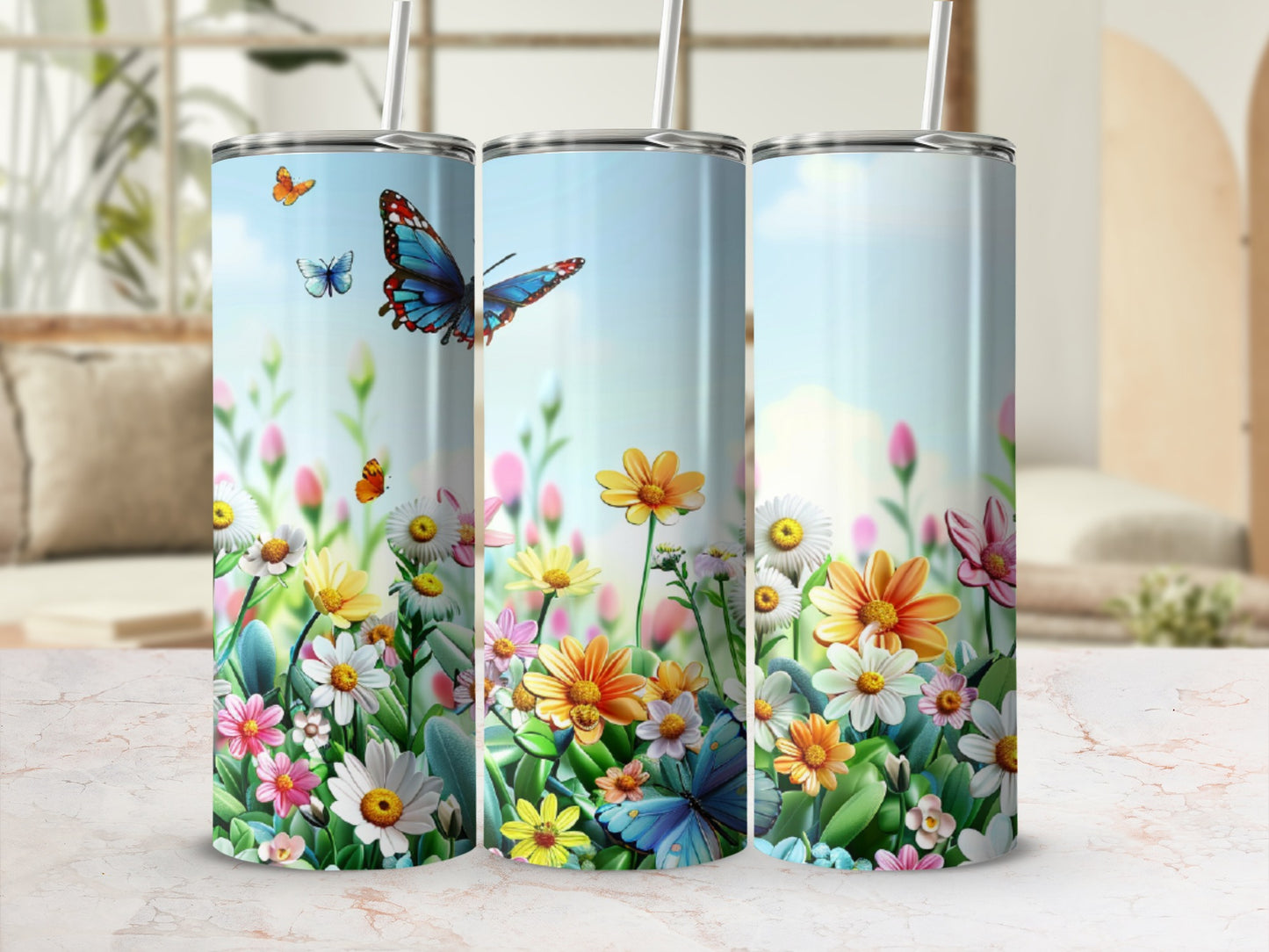 Tumbler with a vibrant floral design featuring butterflies and daisies.