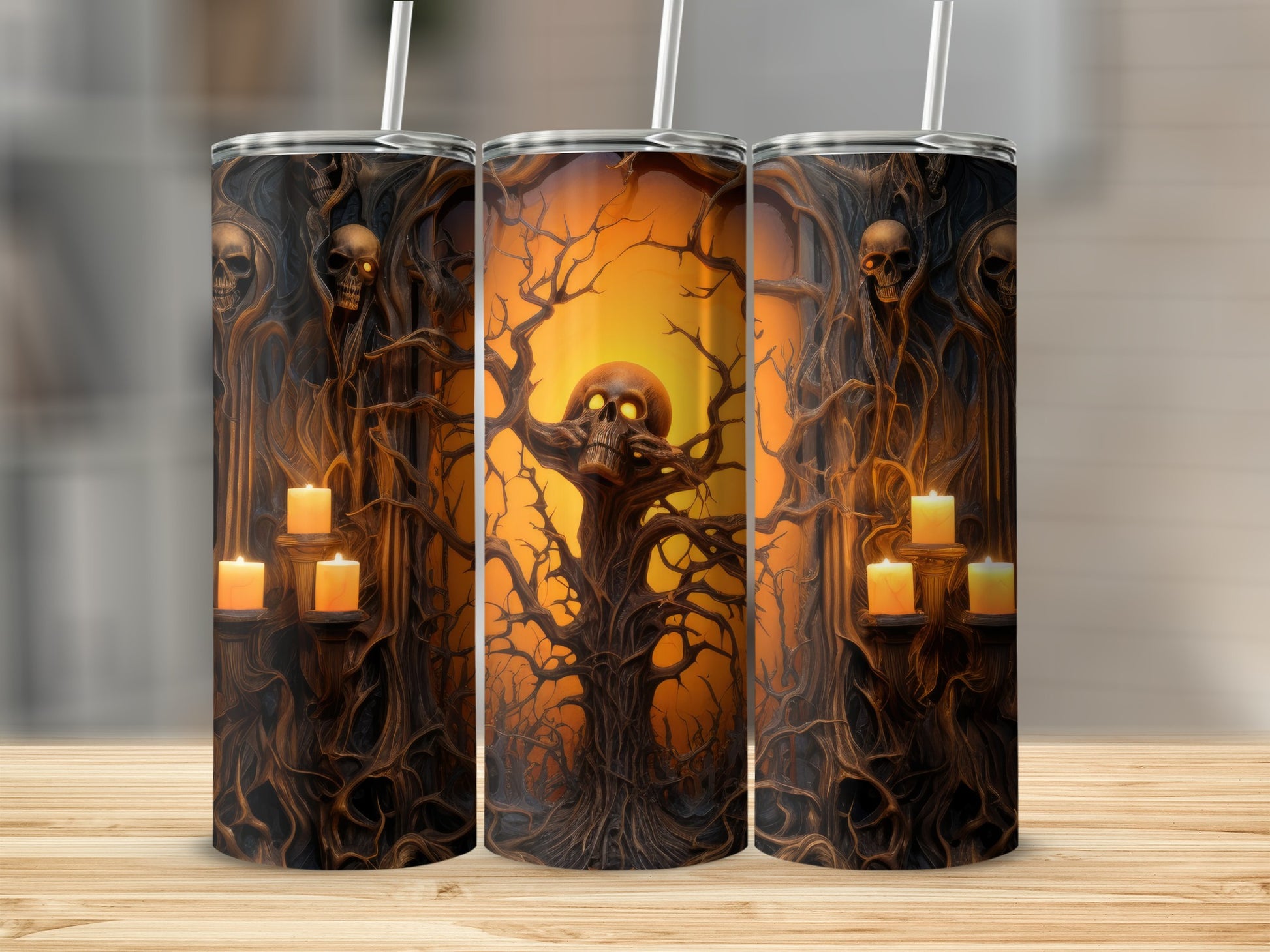 Tumbler with spooky trees, skulls, and glowing candles on an orange sunset background.