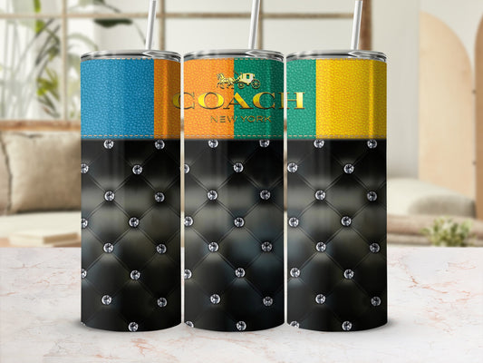 Three patterned tumblers with black diamond tufting and colorful quilted tops.