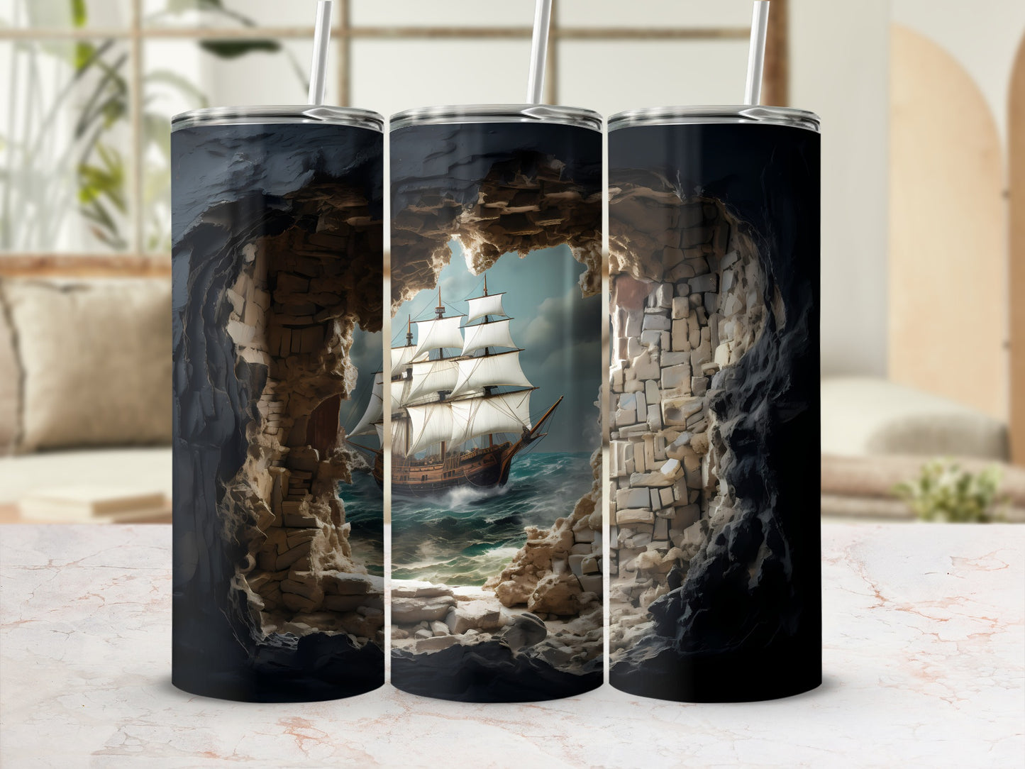 Tumbler with a sailing ship emerging from a rocky cave opening.