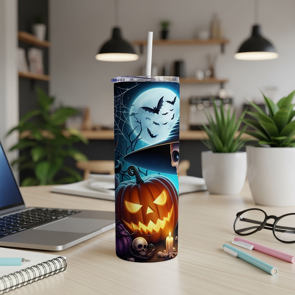 Halloween tumbler with jack-o'-lantern, skull, bats, and moon design.