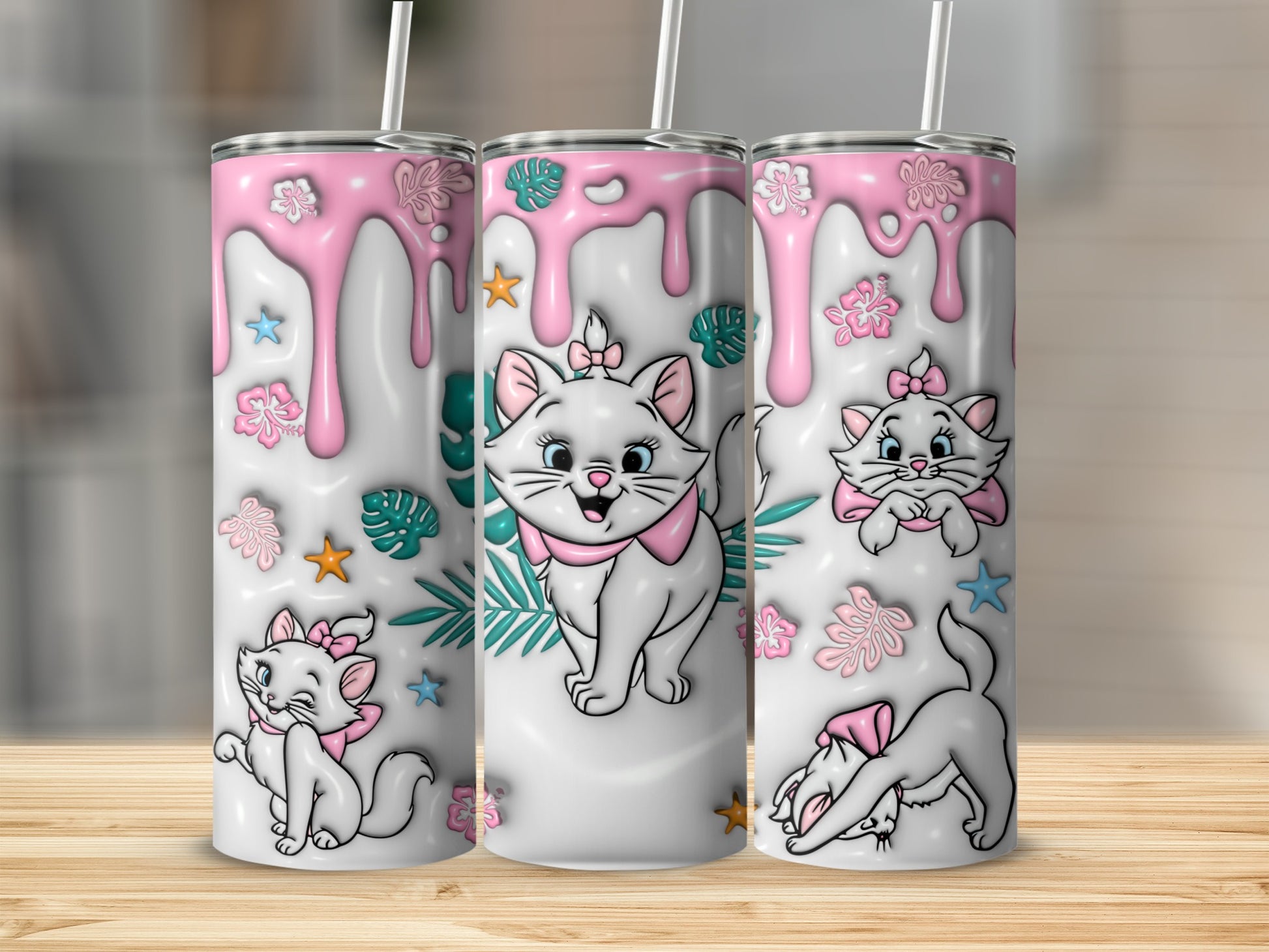 Three cartoon cats with pink bows on a white tumbler with pink drips and floral accents.