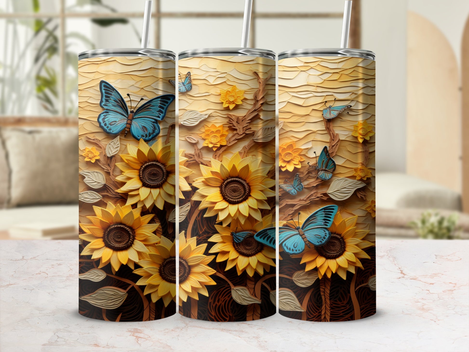 Three tumblers with sunflowers and blue butterflies on a textured background.