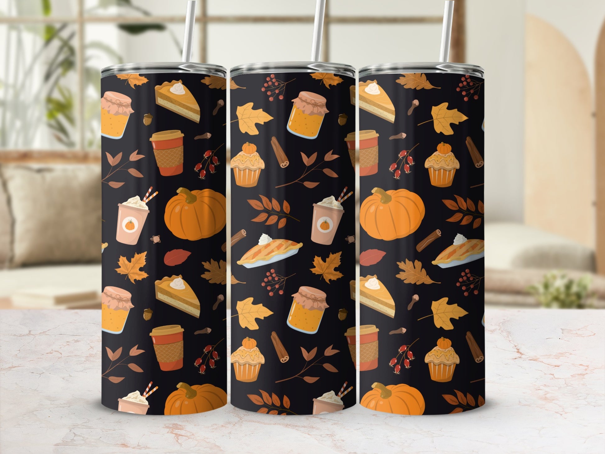 Pumpkin pie, pie slices, and latte cups with fall leaves on a patterned tumbler.