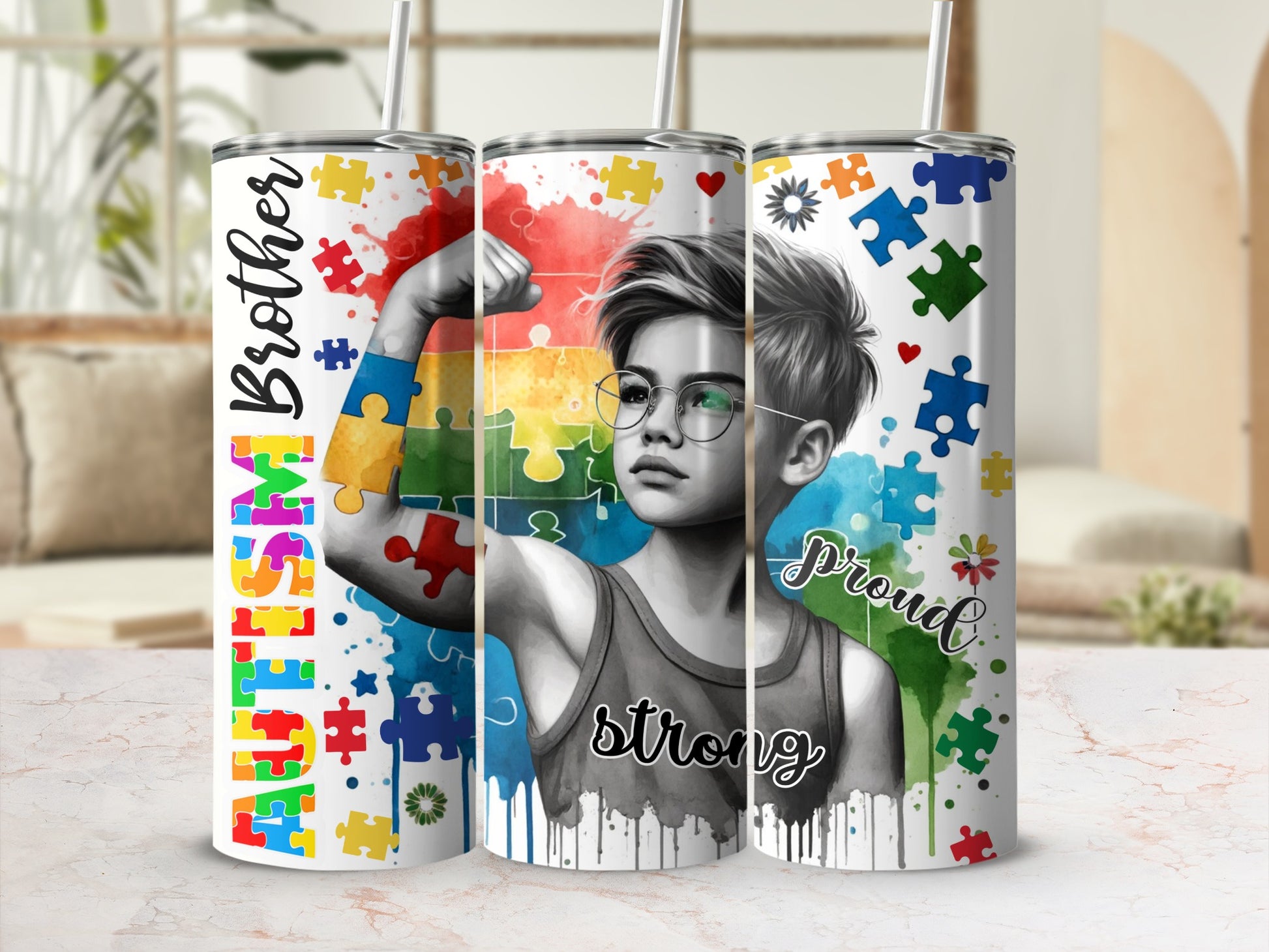 Autism Proud Brother graphic on three tumblers with colorful puzzle pieces.