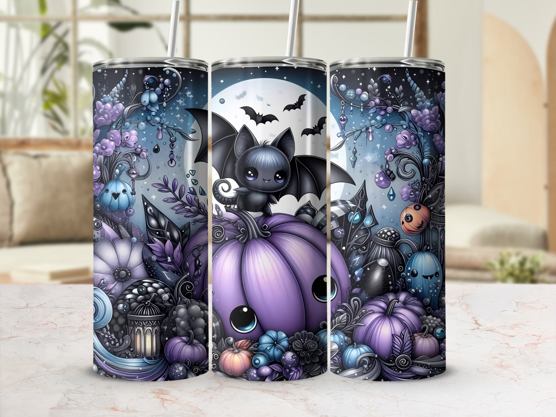 Three tumblers with a whimsical Halloween design featuring a cute bat and pumpkins.