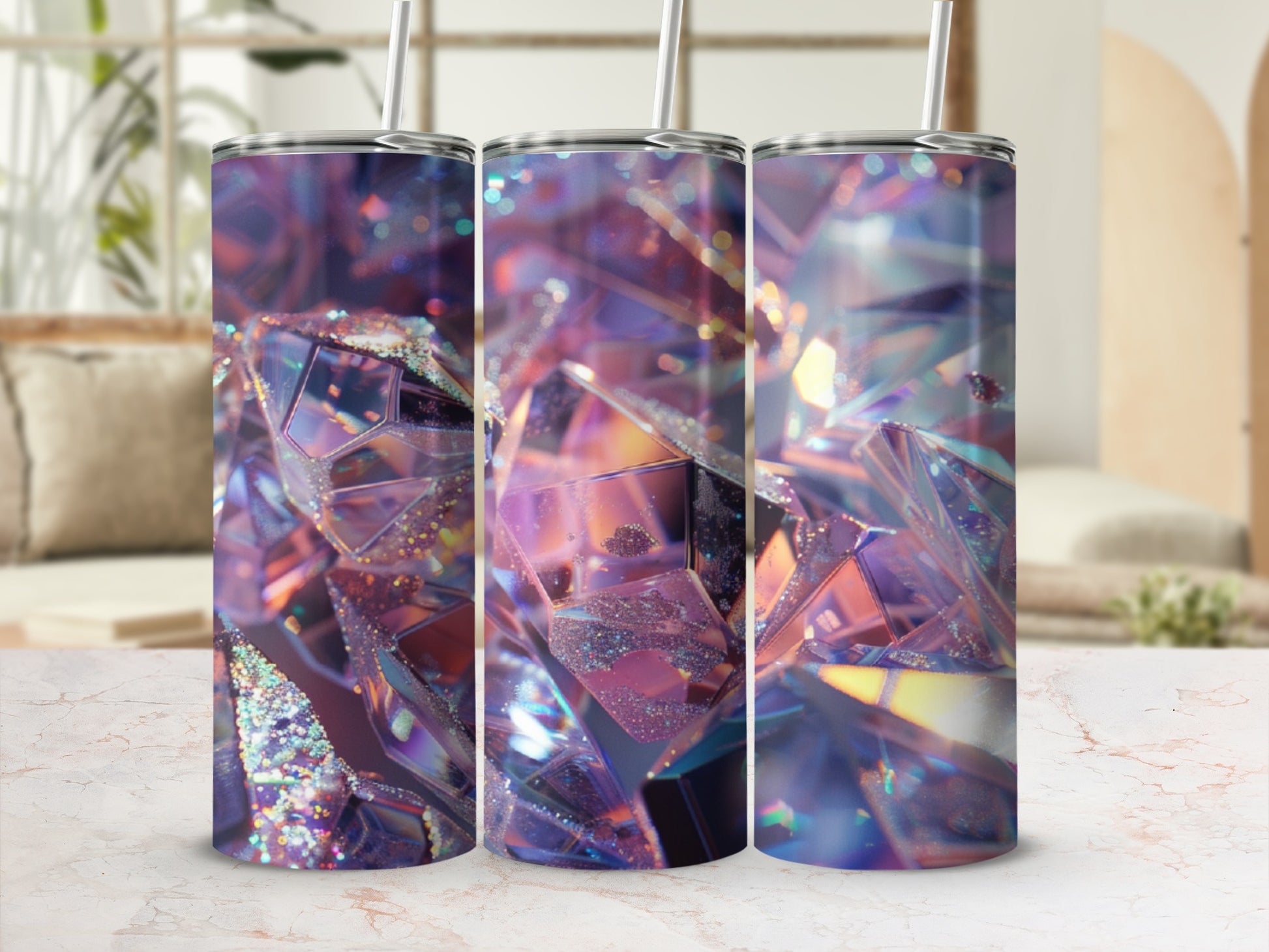 Purple, glittery geometric tumbler with straw on a marble surface.