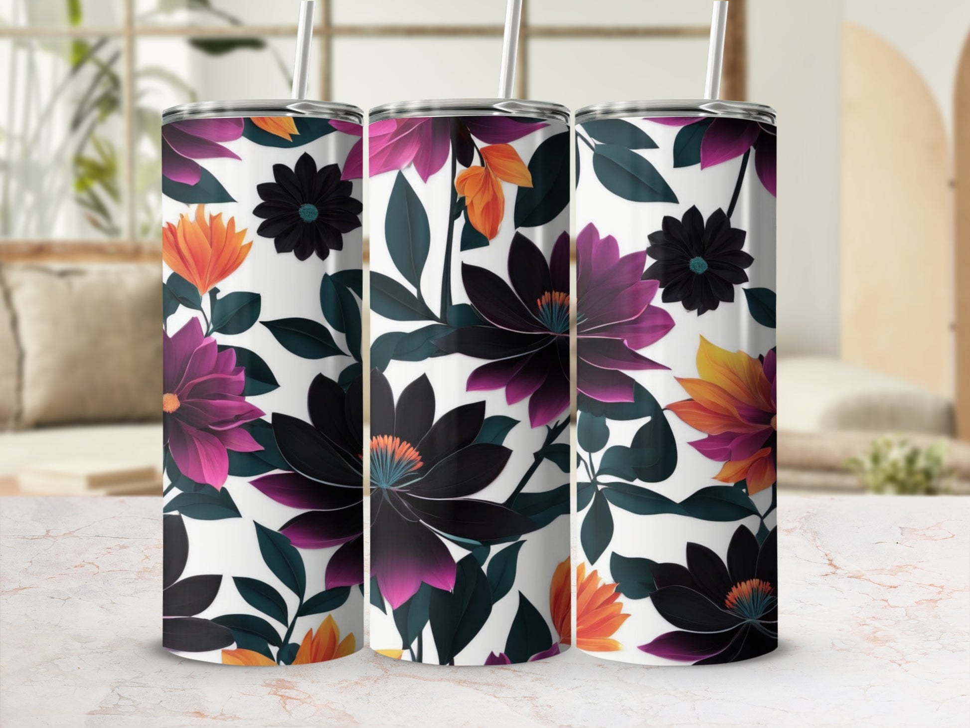 Three tumblers with dark floral and orange leaf designs.