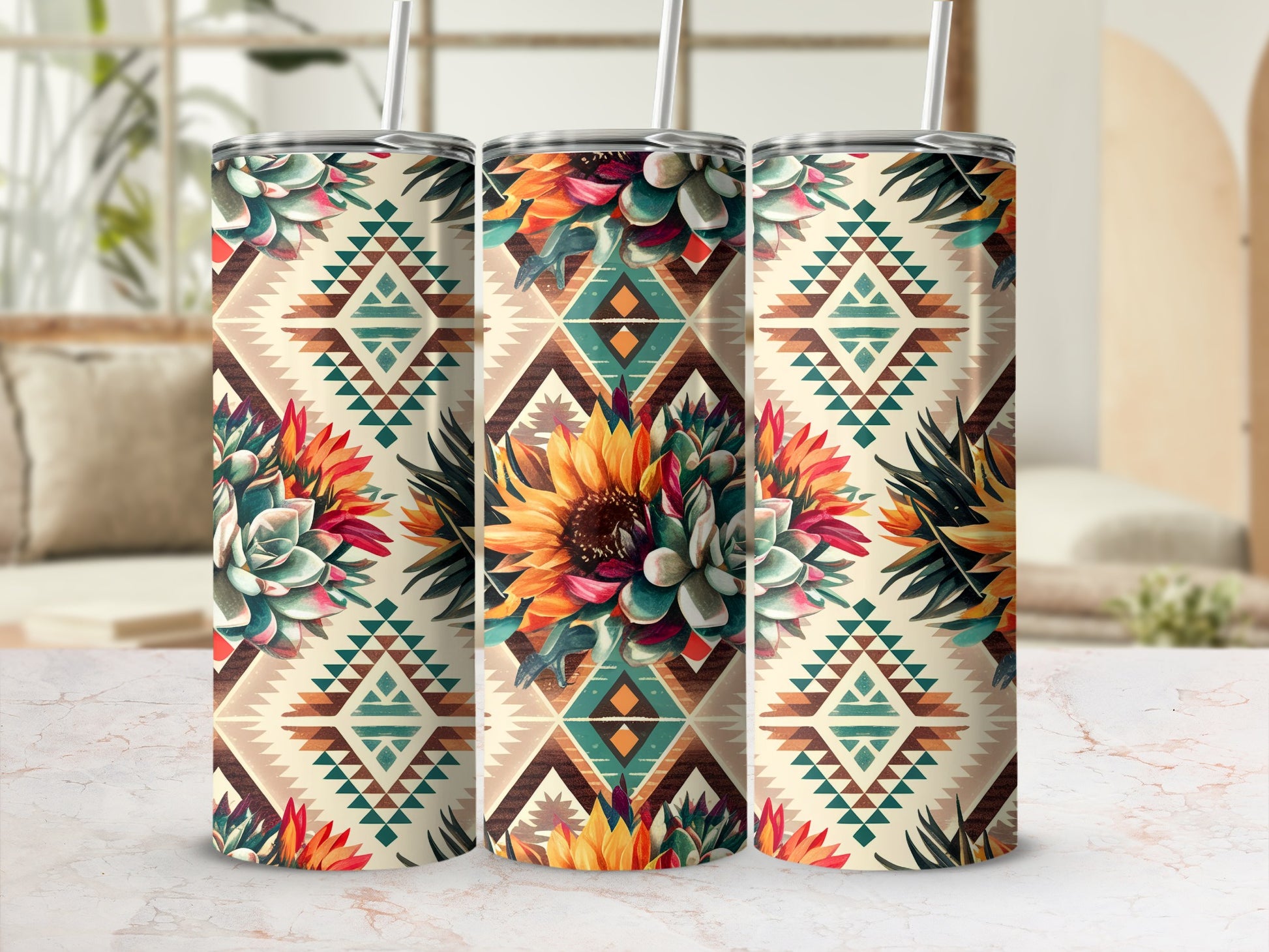 Three patterned tumblers with sunflower and succulent designs.