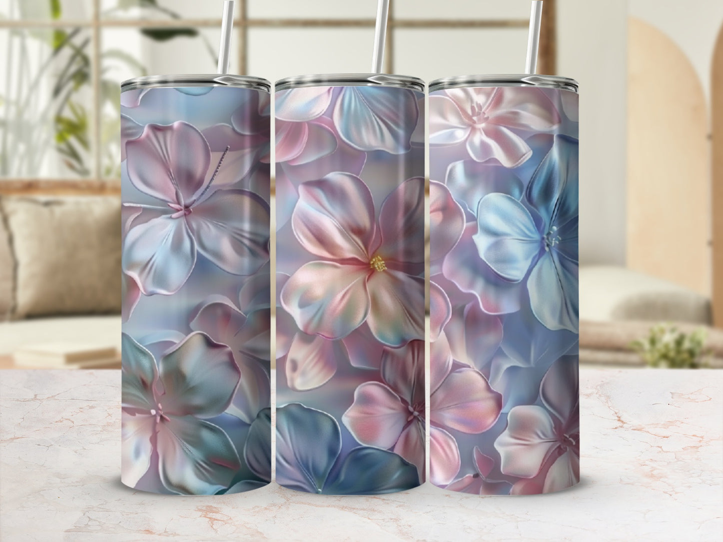 Three tumblers with a pastel floral pattern.