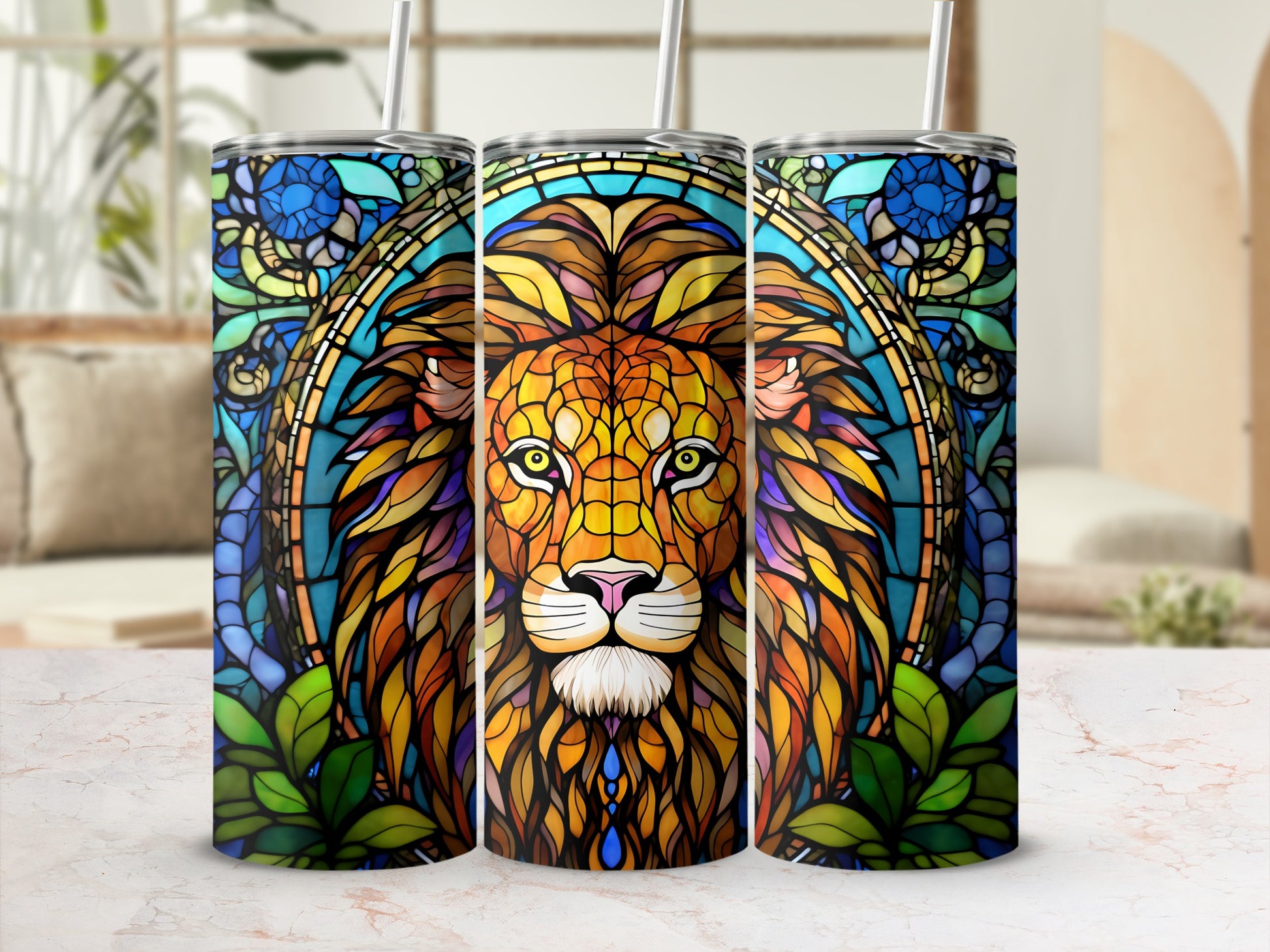 Lion head stained glass design on a tumbler with straw.