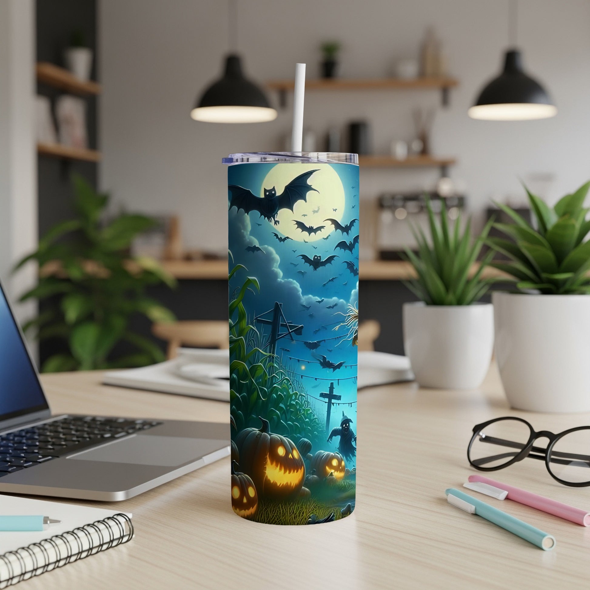 Tumbler with Halloween design featuring bats, pumpkins, a scarecrow, and a cornfield.
