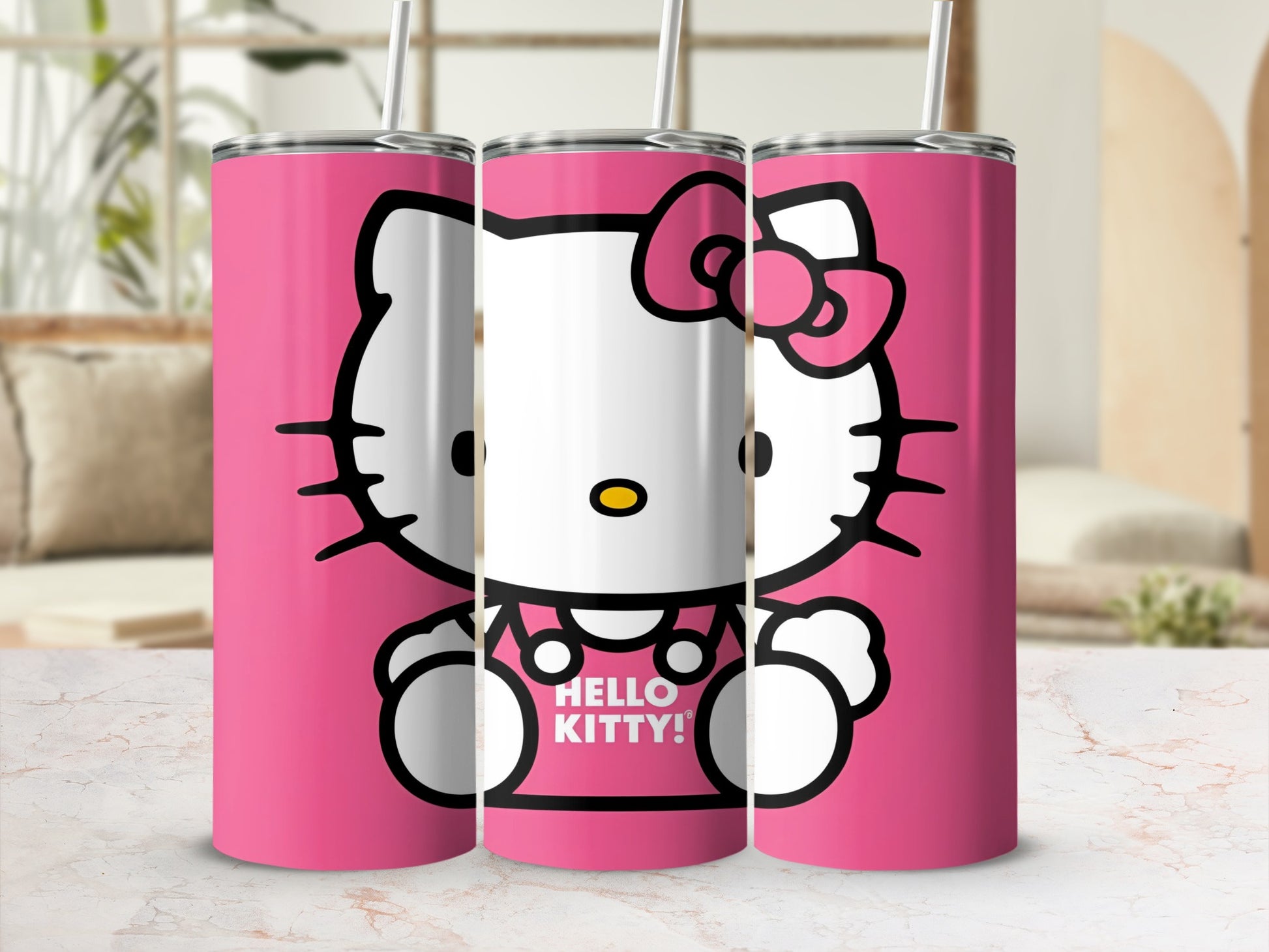 Pink Hello Kitty tumbler with white bow and text.