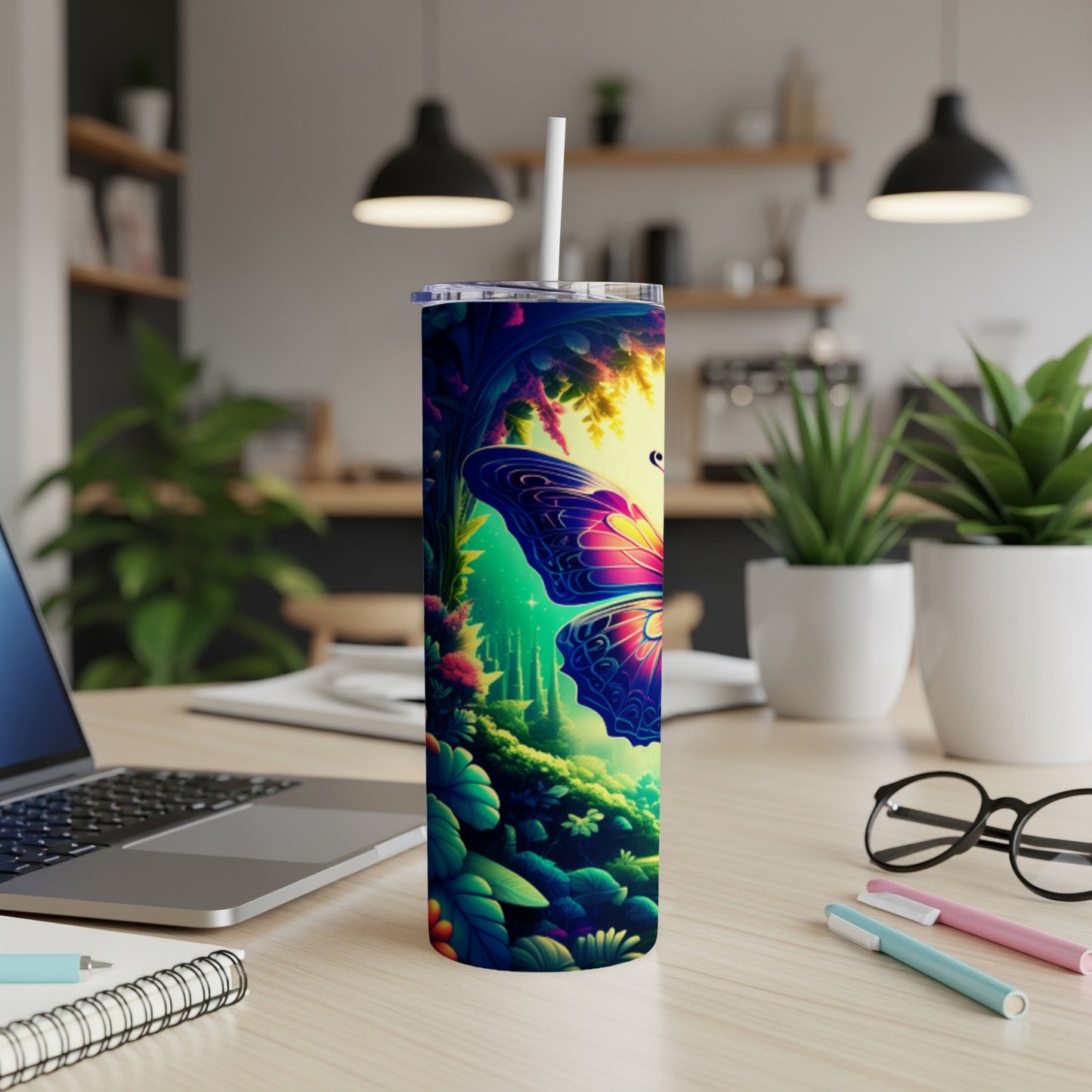 Tumbler with colorful butterfly and forest scene.