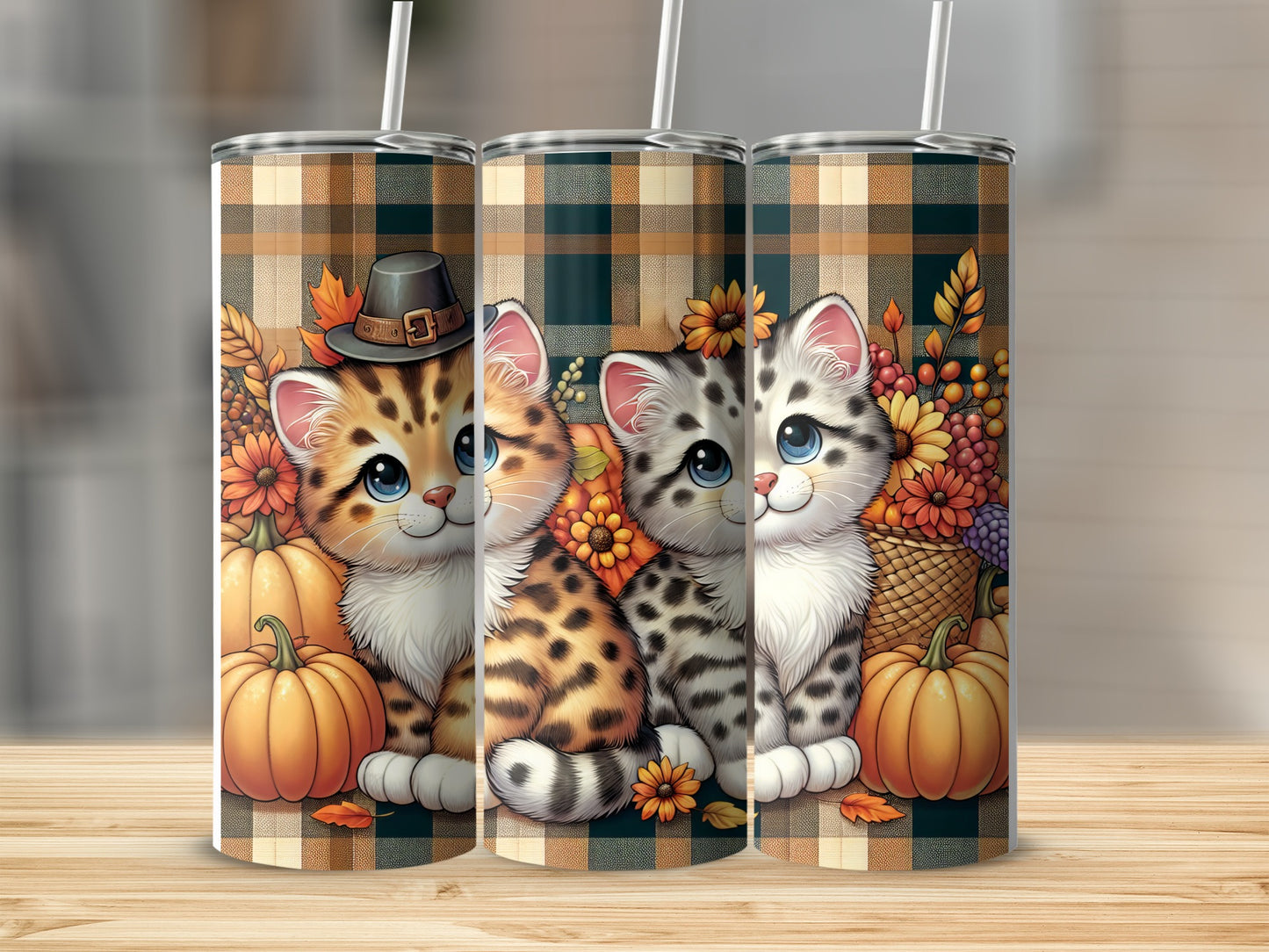Two cute kittens with pumpkins and sunflowers on plaid tumblers.