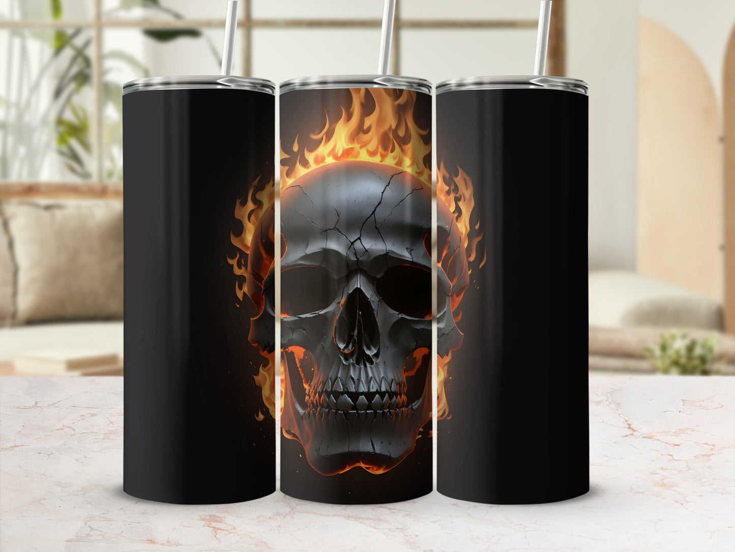 Black tumbler with a flaming skull design on a white marbled surface.