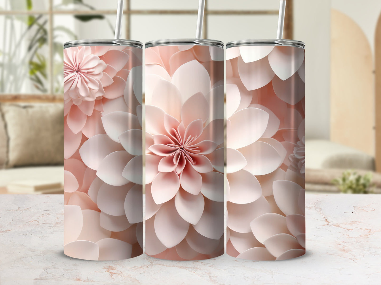 Three tall, slender tumblers with delicate pink floral patterns.