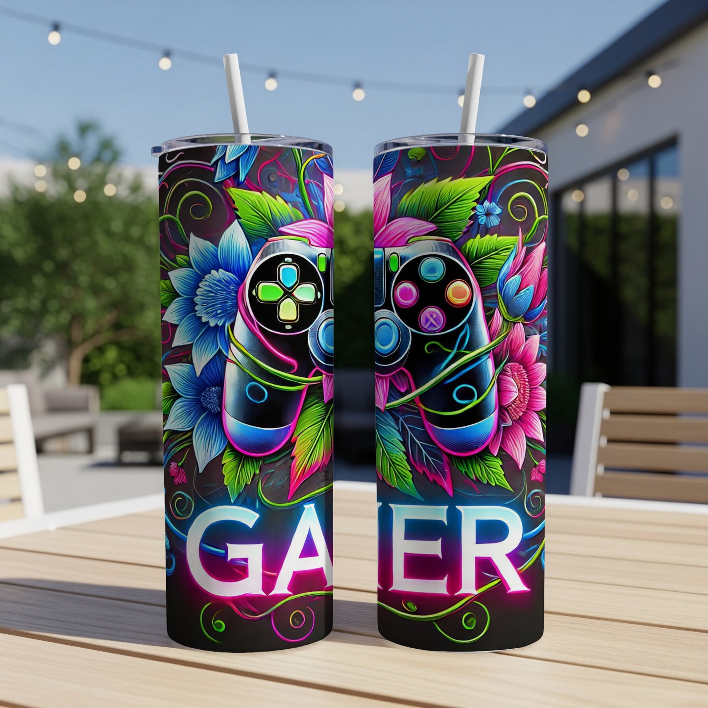 Two tumblers with colorful floral and gaming controller designs.