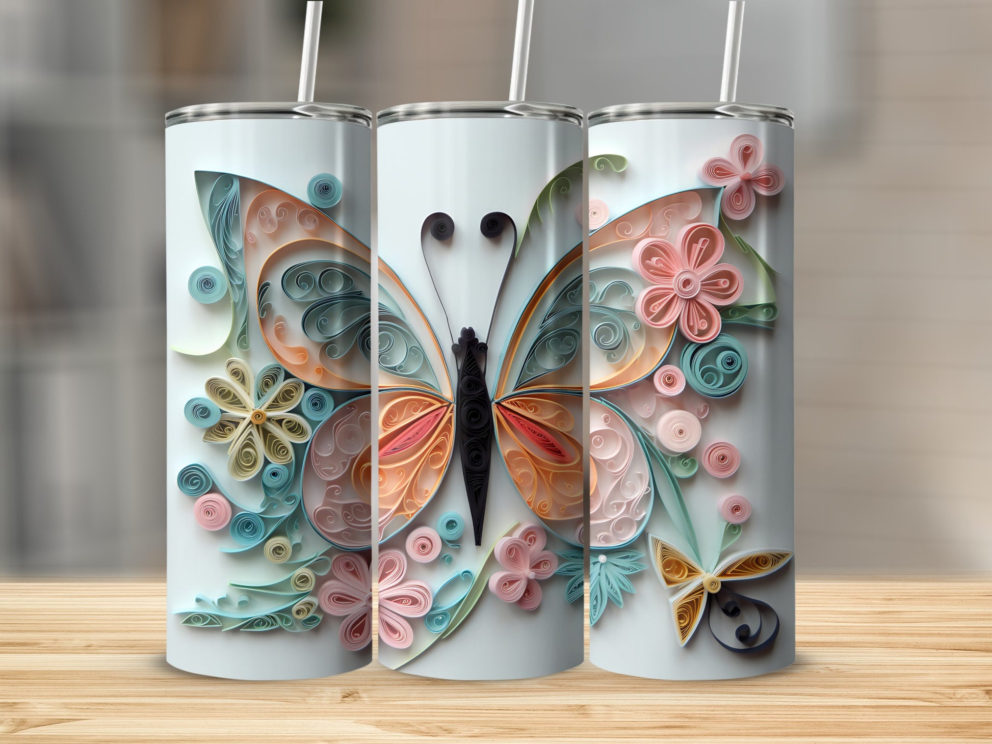 Three seamless tumblers with a quilled paper butterfly and flower design.
