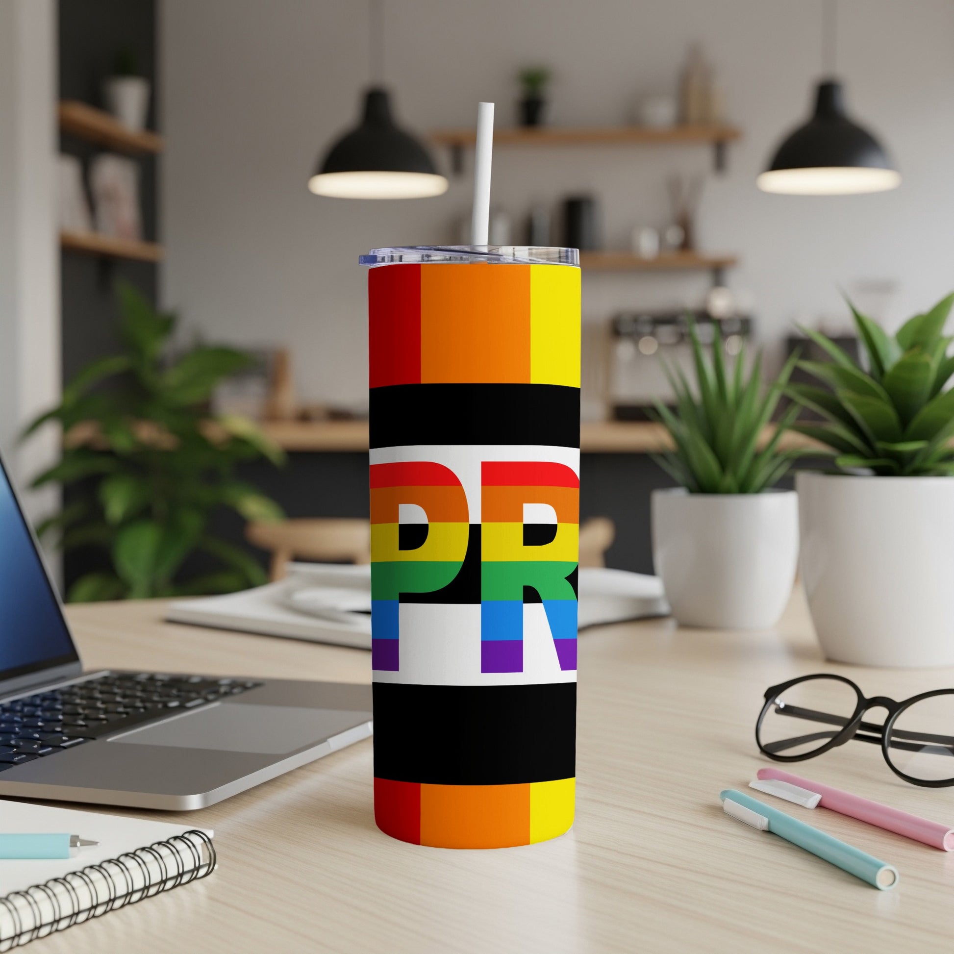 Rainbow PR design tumbler with white lid and straw.