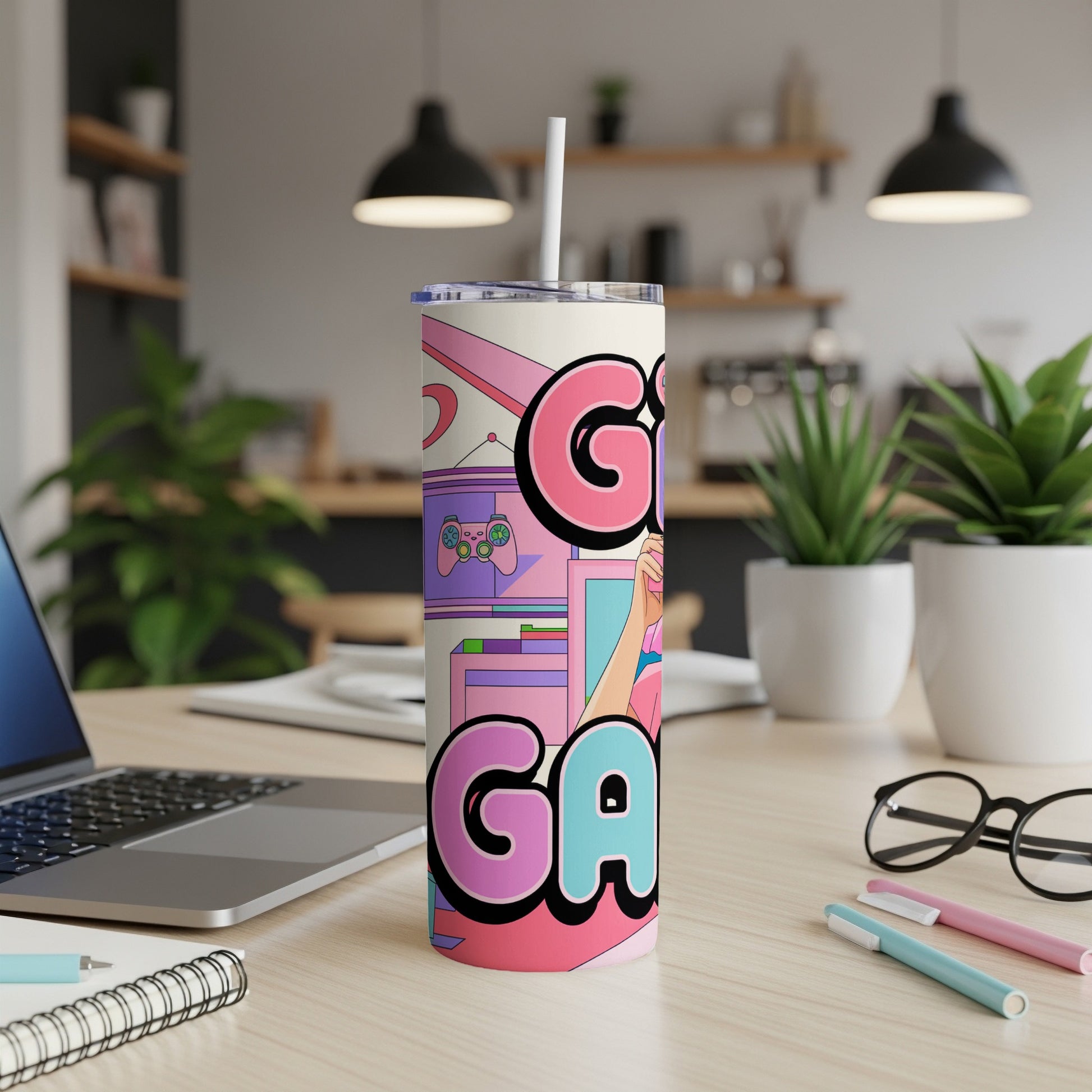 Pink and purple tumbler with "GAMER" text, featuring gaming controllers and console.