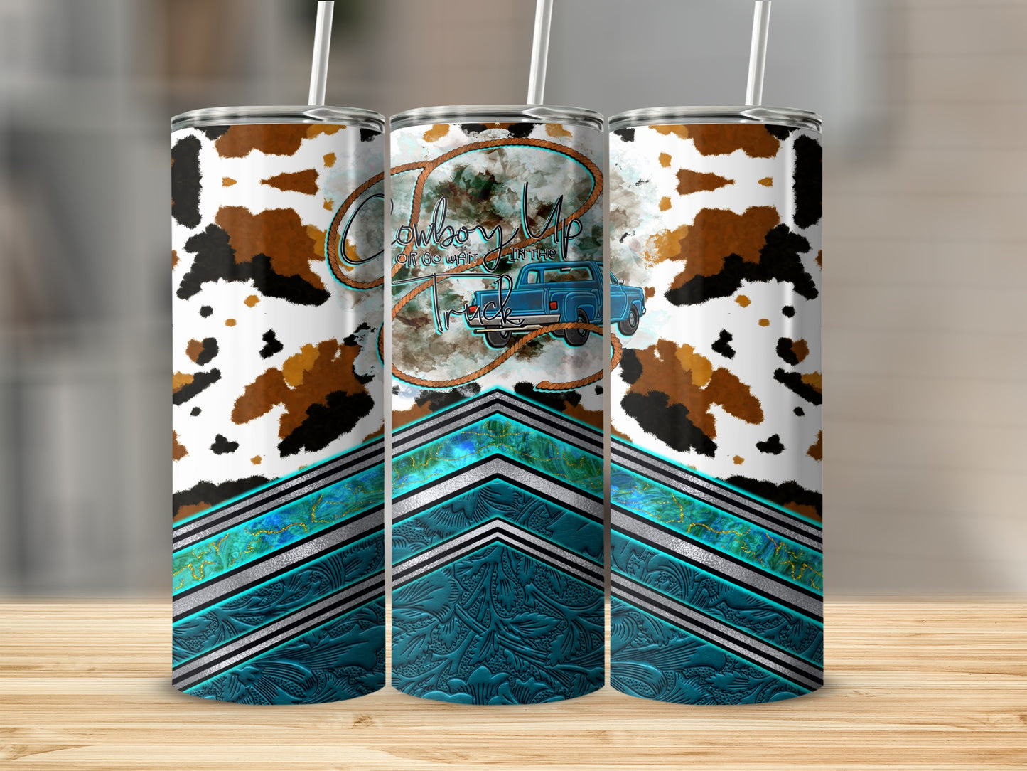 Cowboy up truck design on a white and brown cowhide print tumbler.
