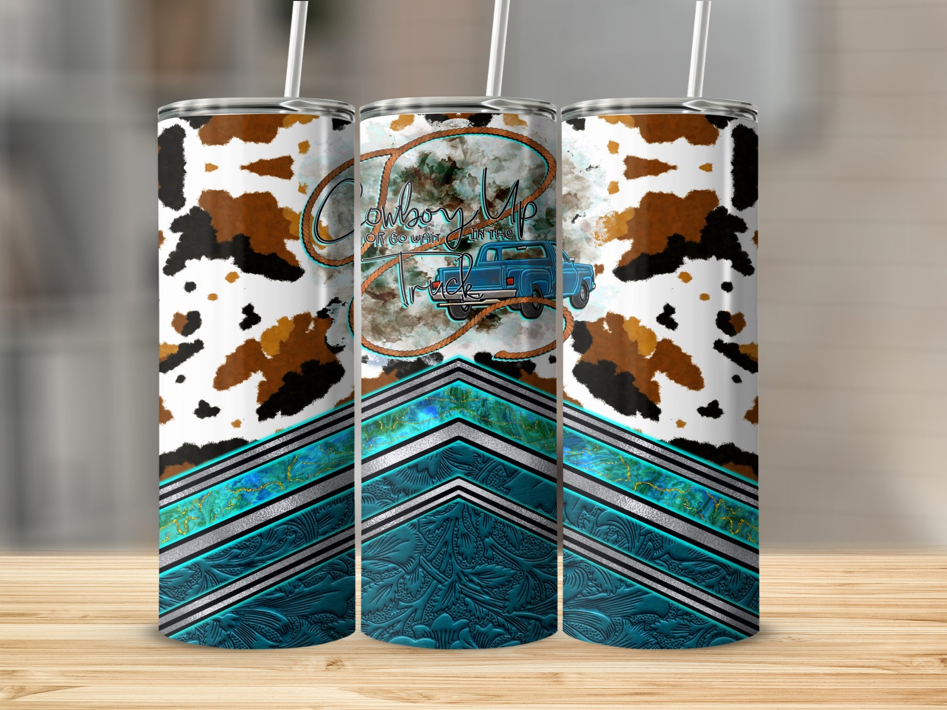 Cowboy up truck design on a white and brown cowhide print tumbler.