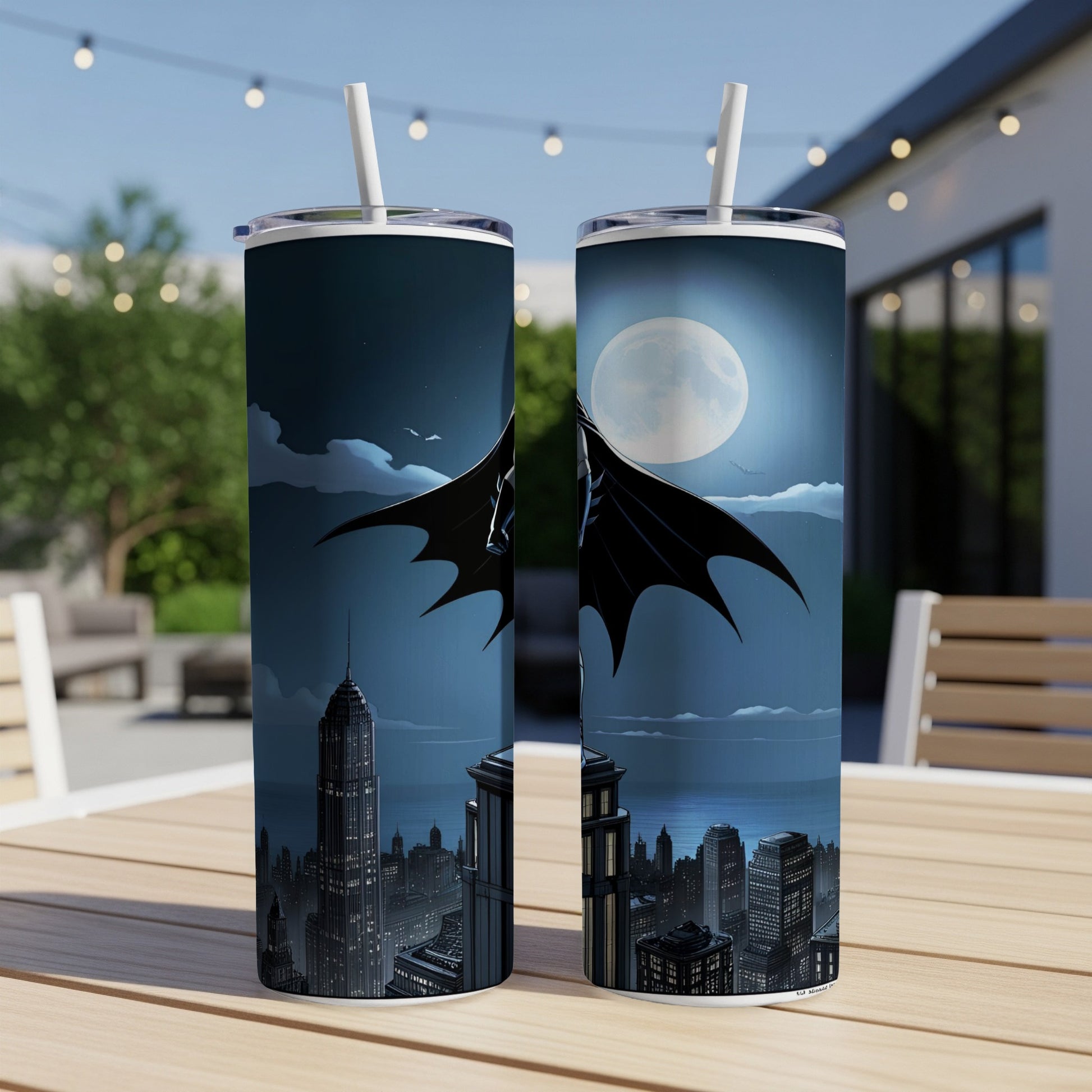 Batman silhouette against a full moon over a cityscape.