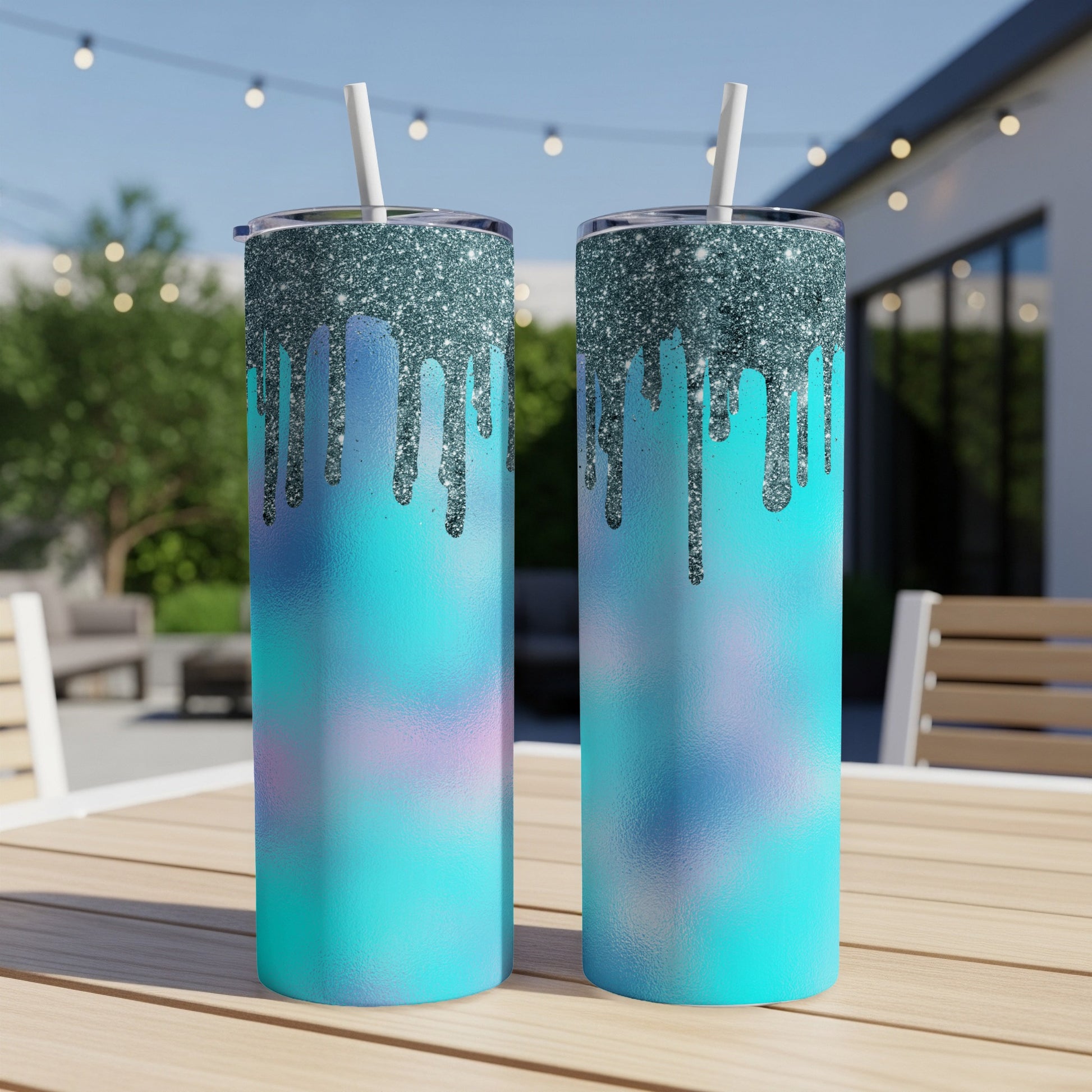 Two tumblers with teal, blue, and purple gradient and glitter drip design.