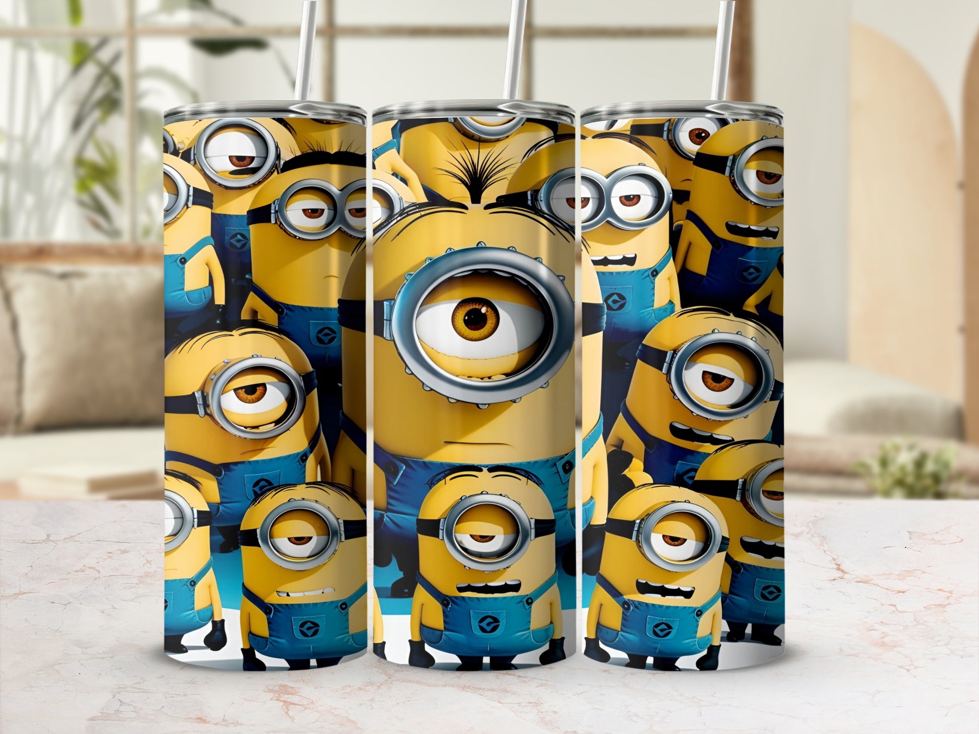 Minions characters on a tumbler with straw, surrounded by blurred background.
