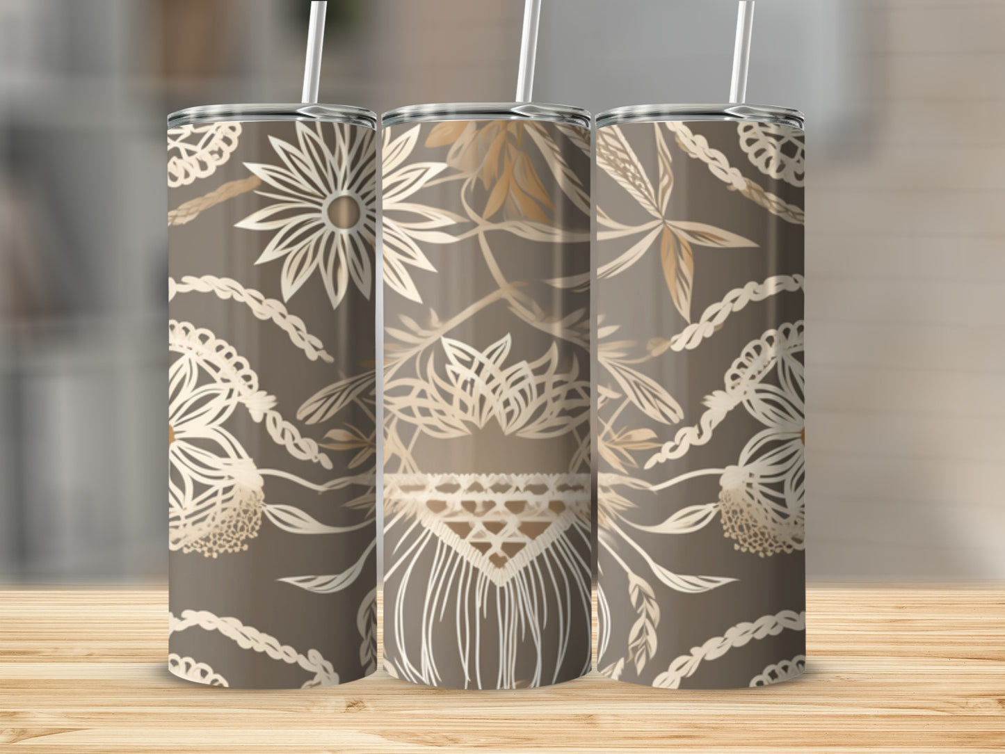 Three tumblers with a boho floral and fringe pattern in beige and tan.