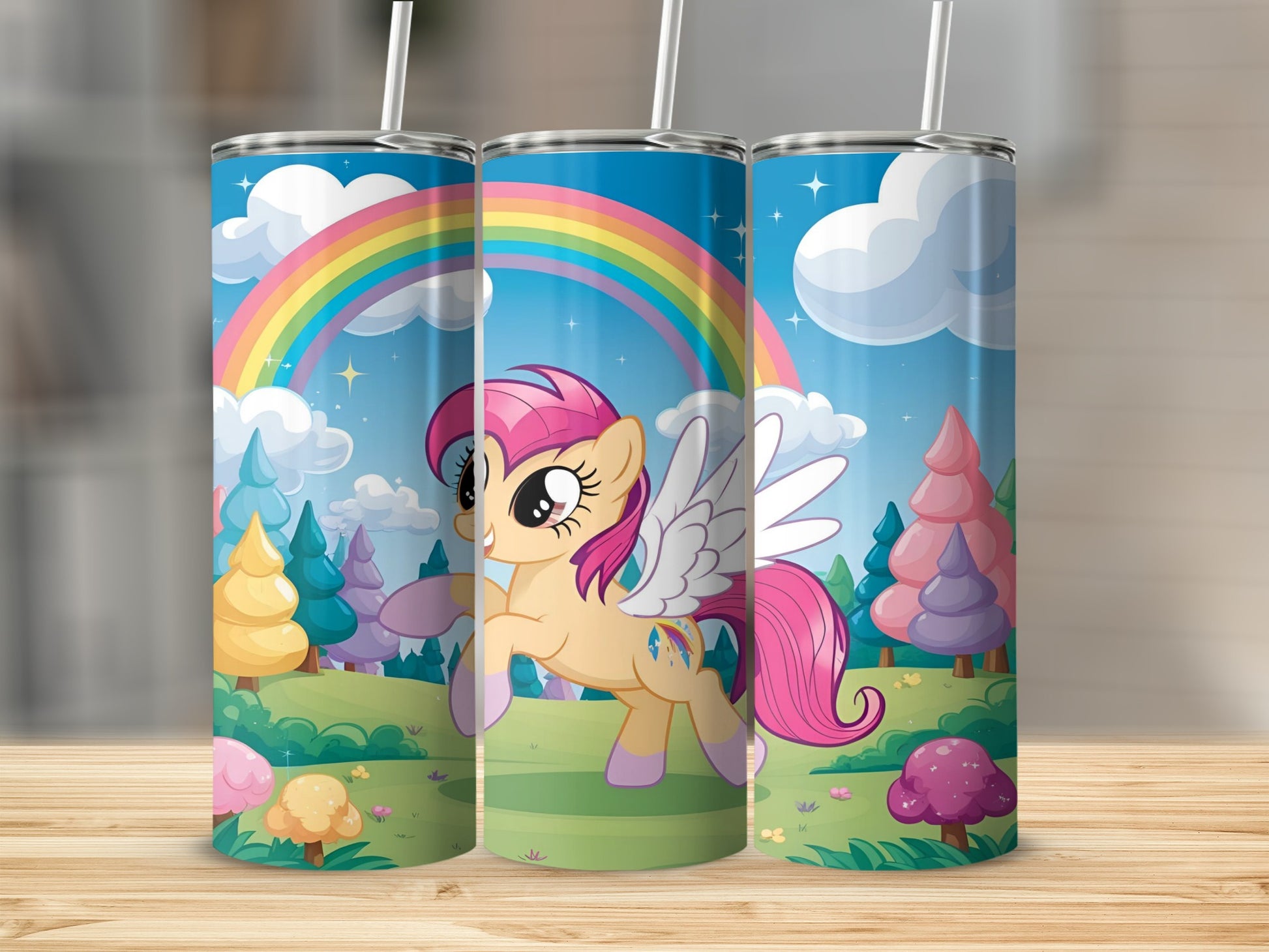 Pink winged pony with rainbow and cartoon trees on a tumbler.