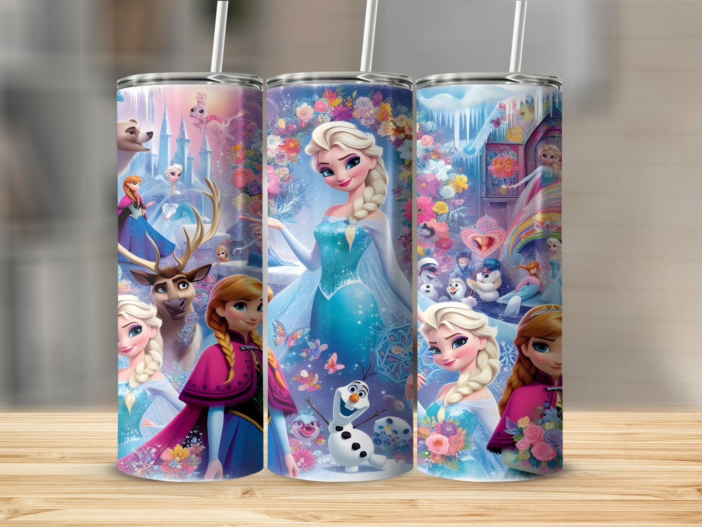 Trio of Frozen tumblers featuring Elsa, Anna, Olaf, and Kristoff in icy, floral scenes.